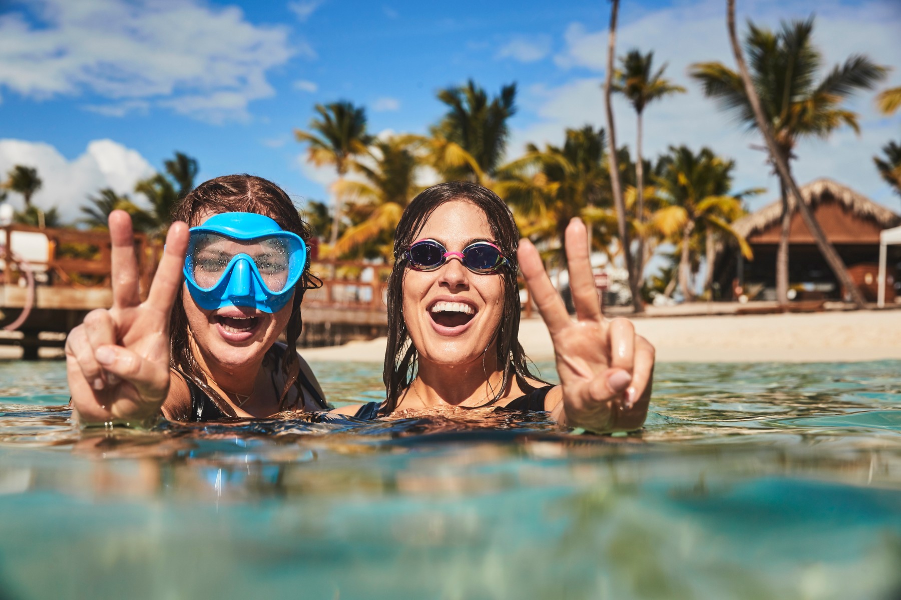 Ashley Graham parades her curves in Swimsuits For All bikini photoshoot with sister