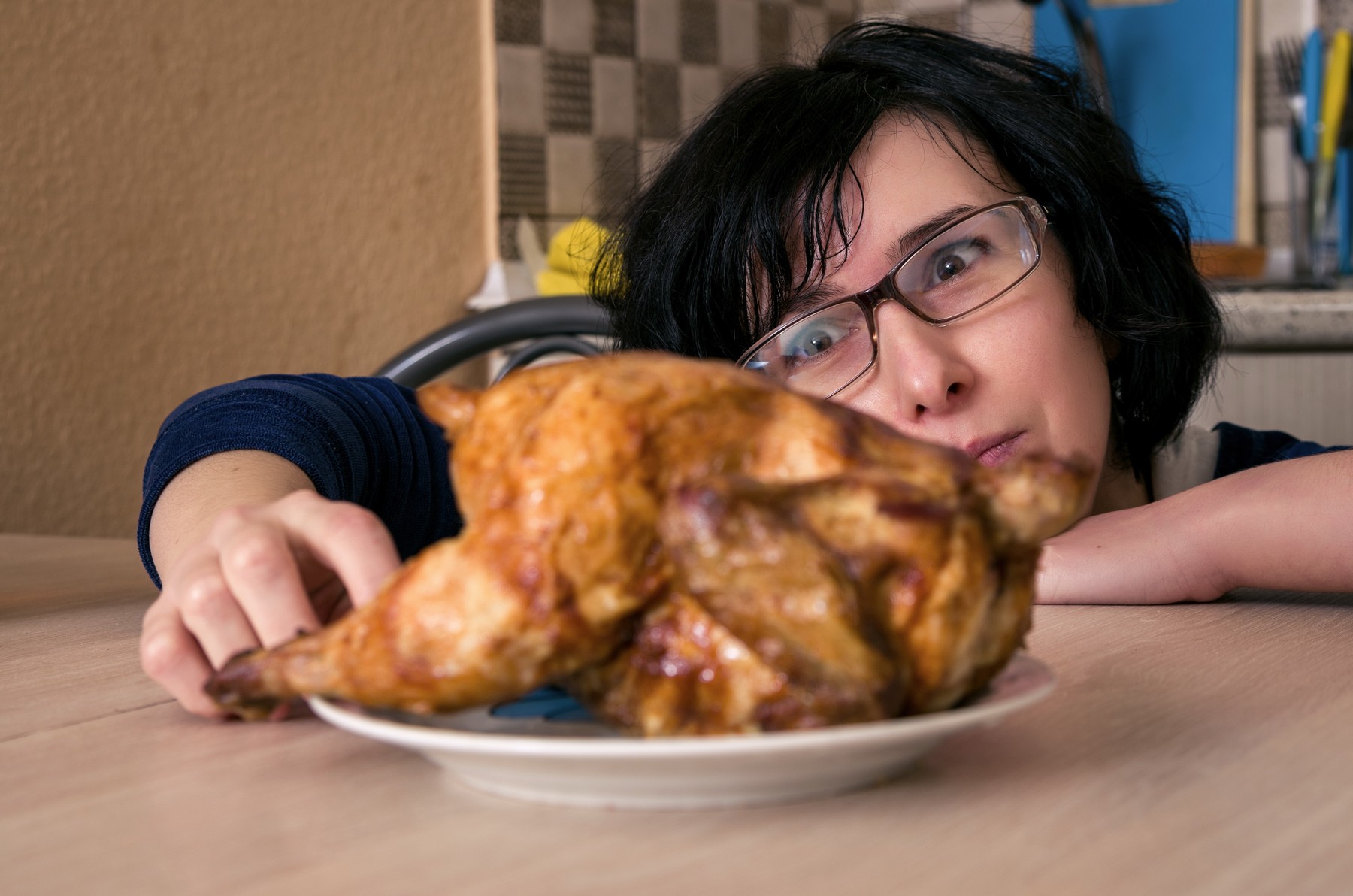 Funny hungry woman looking on the chicken,Image: 539713582, License: Royalty-free, Restrictions: , Model Release: yes, Credit line: George Mdivanian / Panthermedia / Profimedia