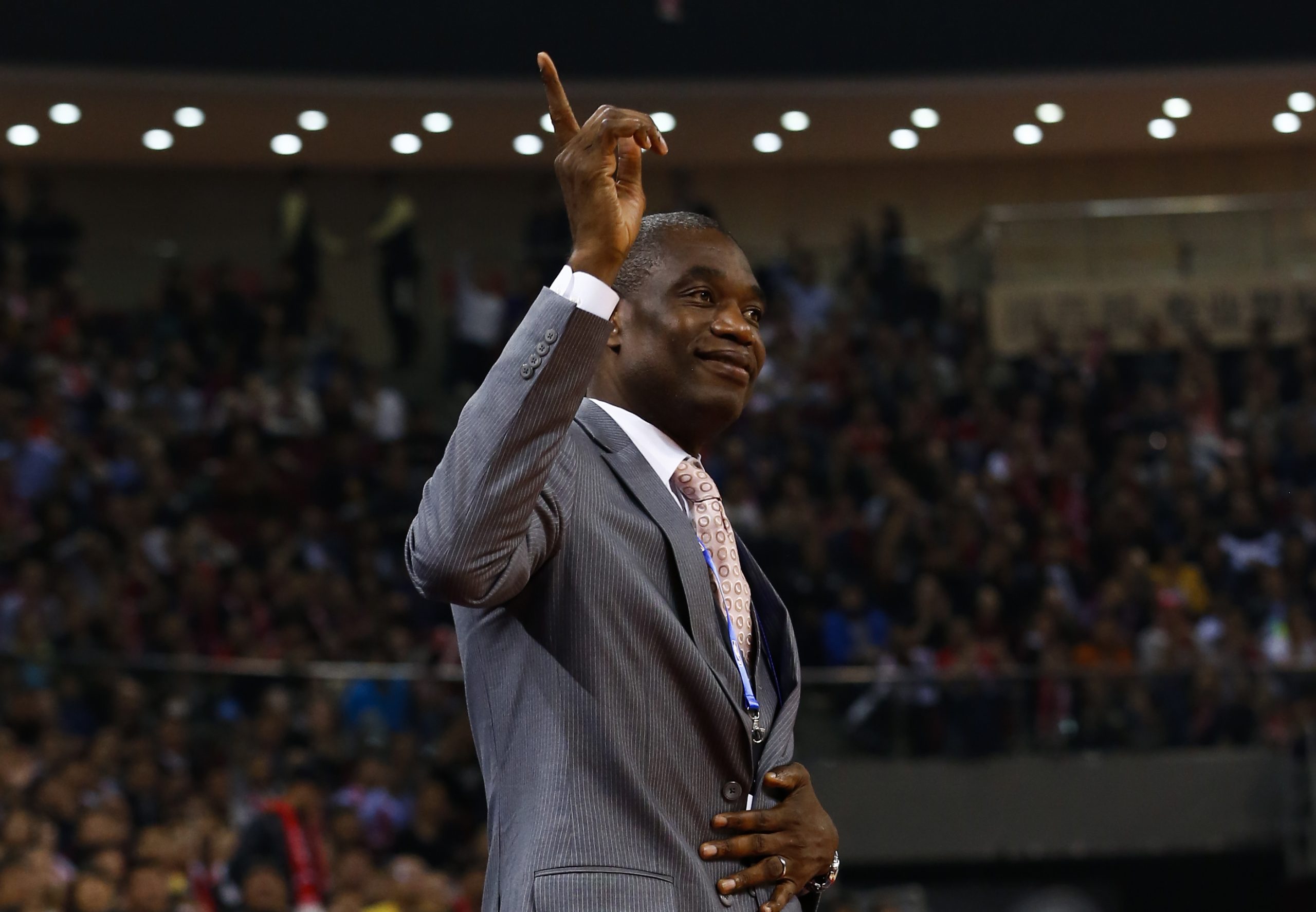 epa05582675 Former Houston Rockets player and NBA Hall of Fame inductee Dikembe Mutombo attends the NBA preseason game between the New Orleans Pelicans and the Houston Rockets at the LeSports Center in Beijing, China, 12 October 2016.  EPA/ROLEX DELA PENA