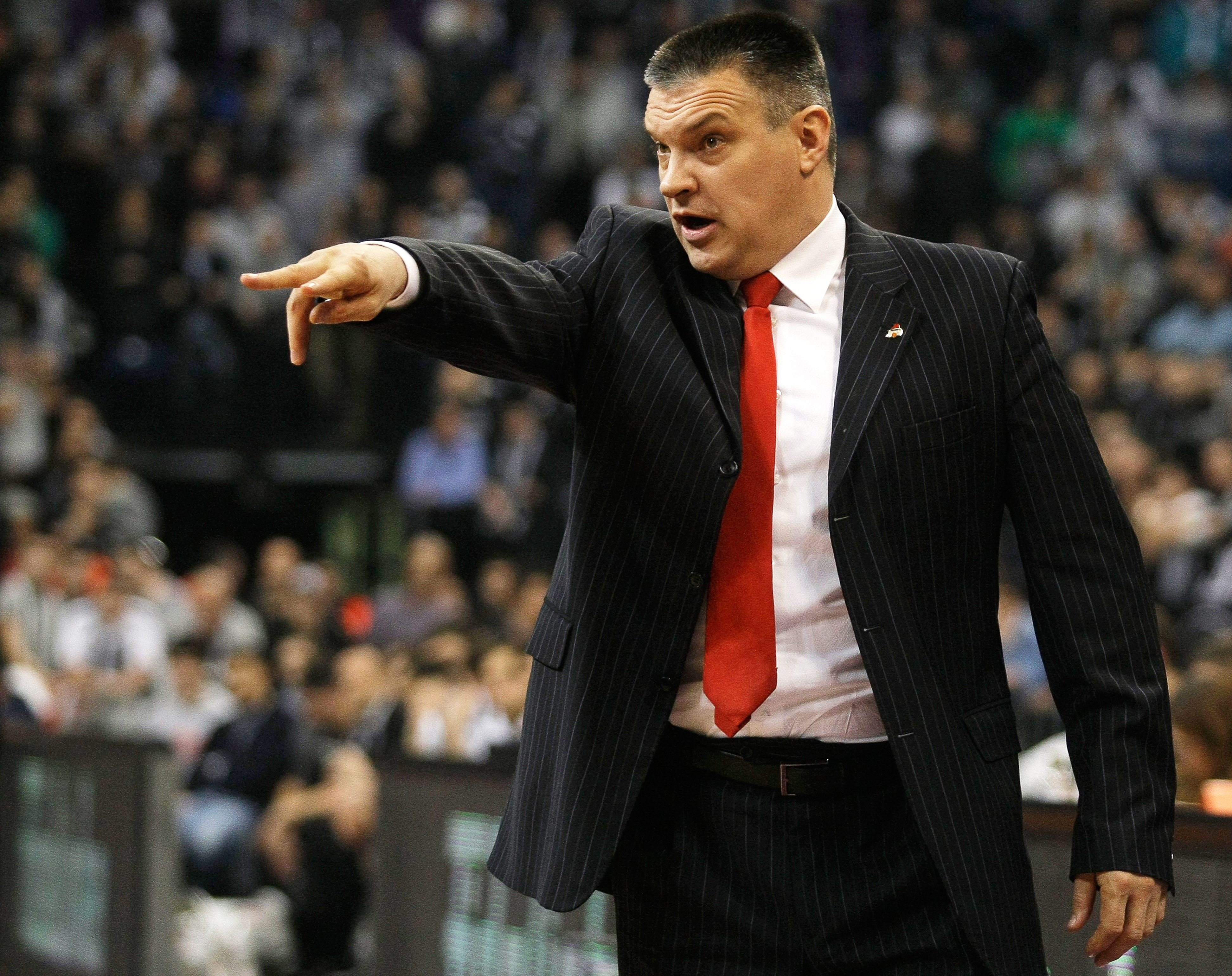 epa04050148 Lokomotiv Kuban Krasnodar head coach Evgeny Pashutin gestures during the Euroleague Top 16 basketball game between Partizan Belgrade and Lokomotiv Kuban Krasnodar in Belgrade, Serbia, 31 January 2014.  EPA/ANDREJ CUKIC