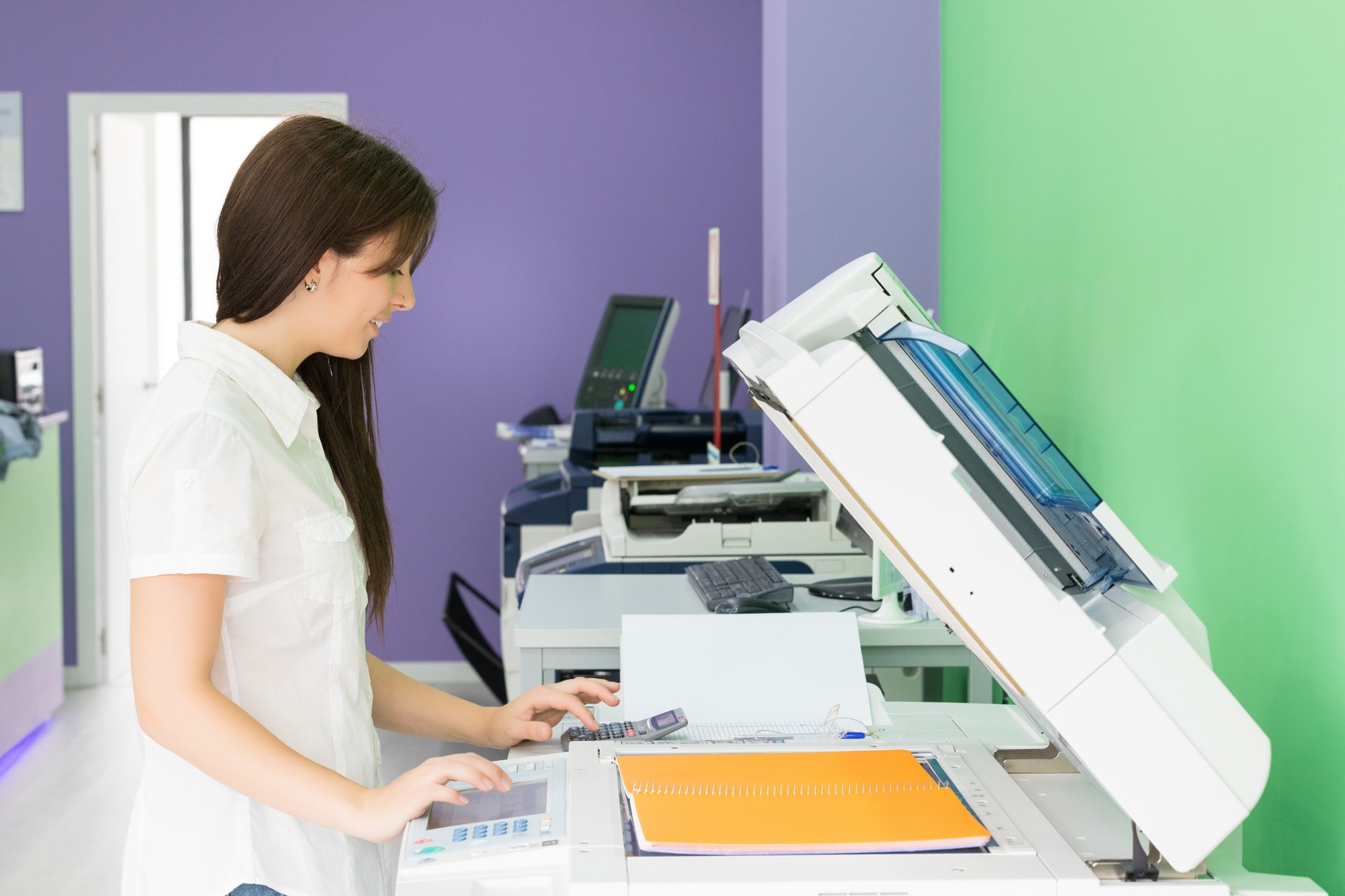 A young student at a copy center taking some copies for her final exams,Image: 587791056, License: Royalty-free, Restrictions: , Model Release: yes, Credit line: Hugo Felix / Panthermedia / Profimedia