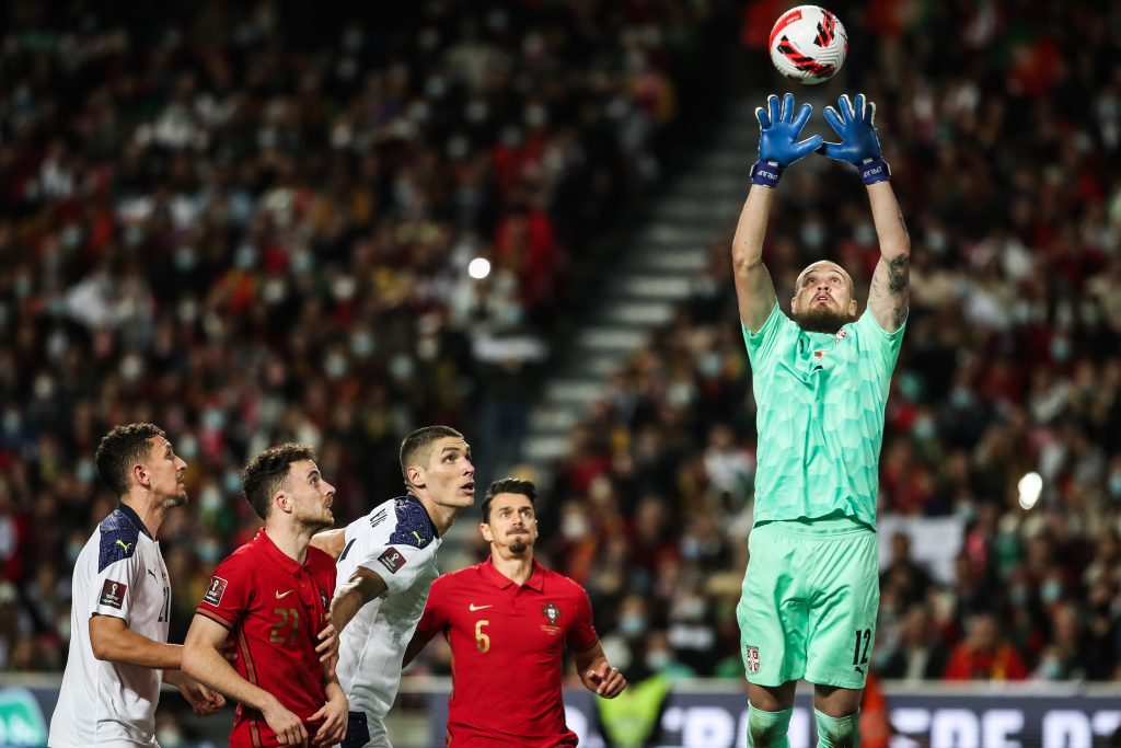 epa09582519 Portugal's Diogo Jota (2L) and Jose Fonte (2R) in action against Serbia's goalkeeper Predrag Rajkovic (R) during the FIFA World Cup 2022 qualifying group A soccer match at Luz stadium, in Lisbon, Portugal, 14 November 2021.  EPA-EFE/MARIO CRUZ