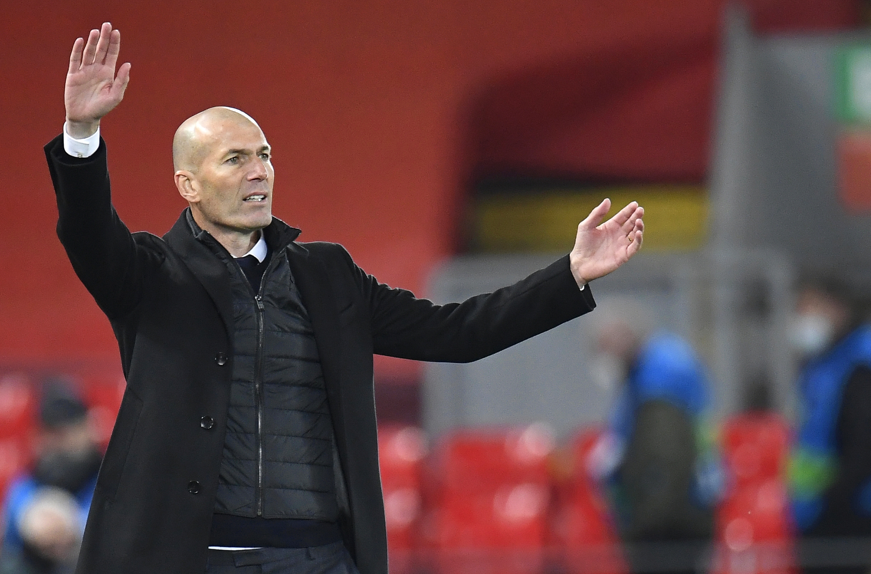 epa09135910 Real Madrid's head coach Zinedine Zidane reacts during the UEFA Champions League quarter final, second leg soccer match between Liverpool FC and Real Madrid in Liverpool, Britain, 14 April 2021.  EPA-EFE/Peter Powell