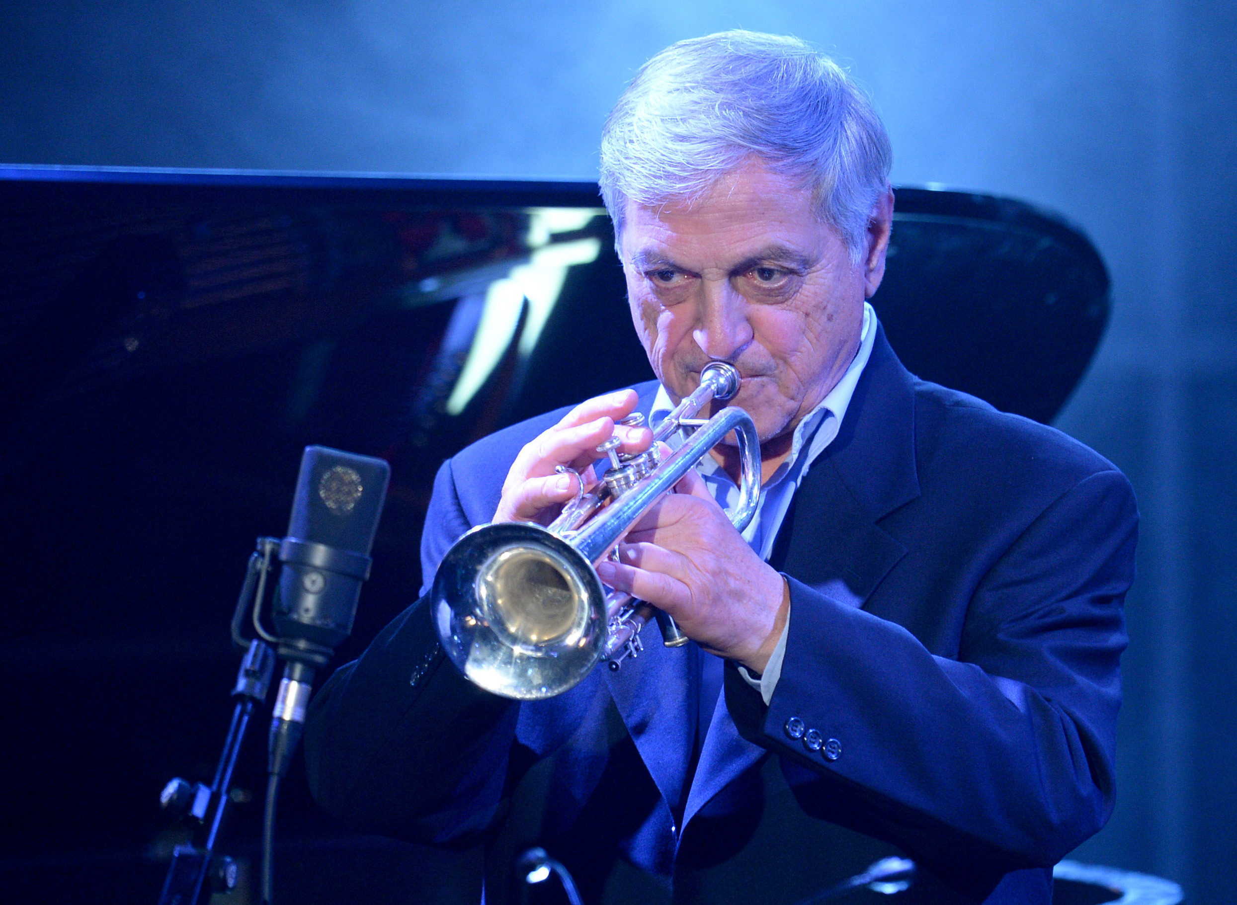 epa04219714 Serbian trumpeter Dusko Goykovich performs during the Echo Jazz 2014 awards ceremony in Hamburg, Germany, 22 May 2014. The Echo Jazz awards are presented for the fifth time in 21 categories by the Deutsche Phono-Akademie.  EPA/DANIEL REINHARDT
