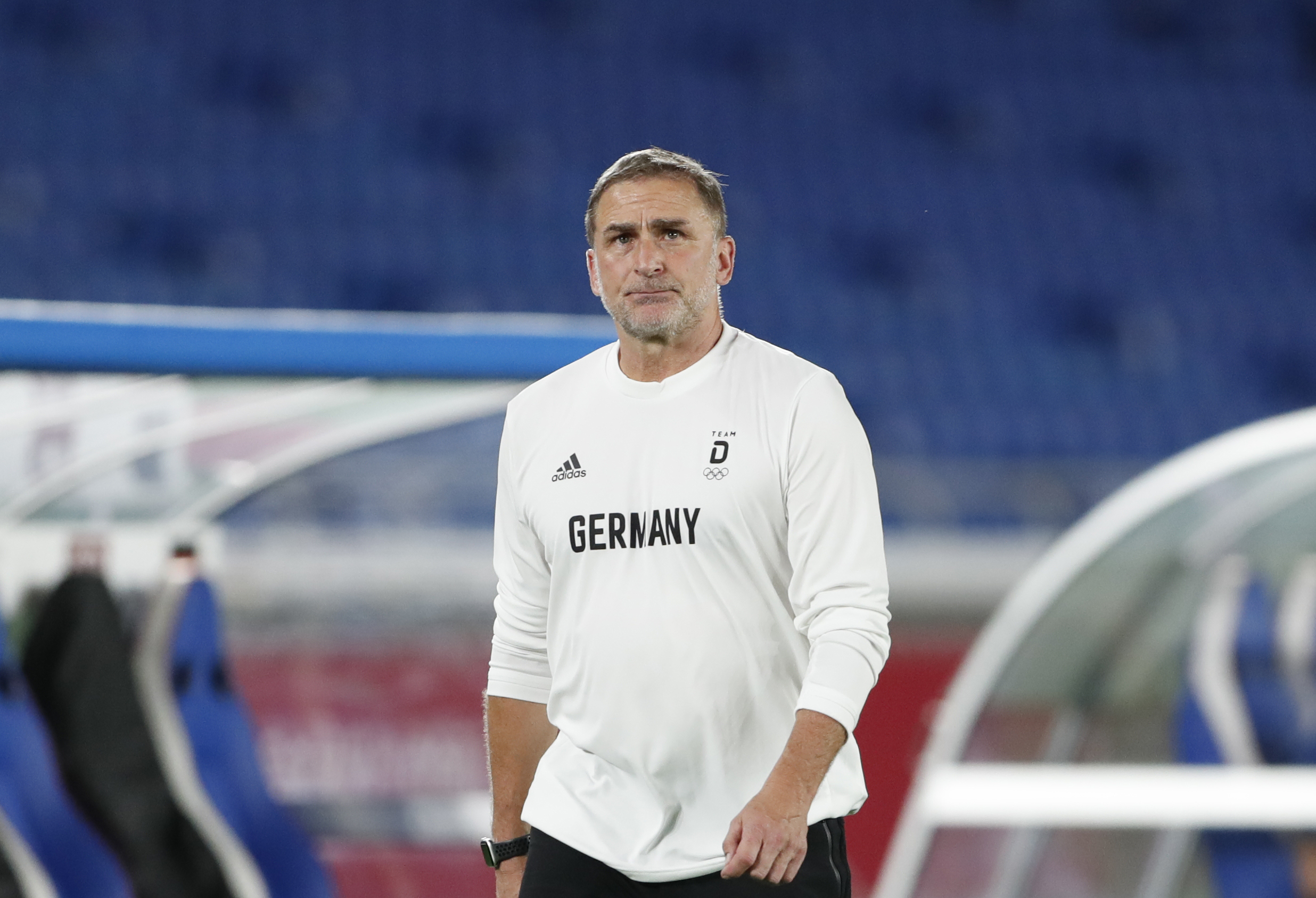 epa09358141 Head coach of Germany, Stefan Kuntz reacrs  during the men's soccer group stage match between Germany and Brazil at the Tokyo 2020 Olympic Games in Yokohama, Japan, 22 July 2021.  EPA-EFE/KIYOSHI OTA