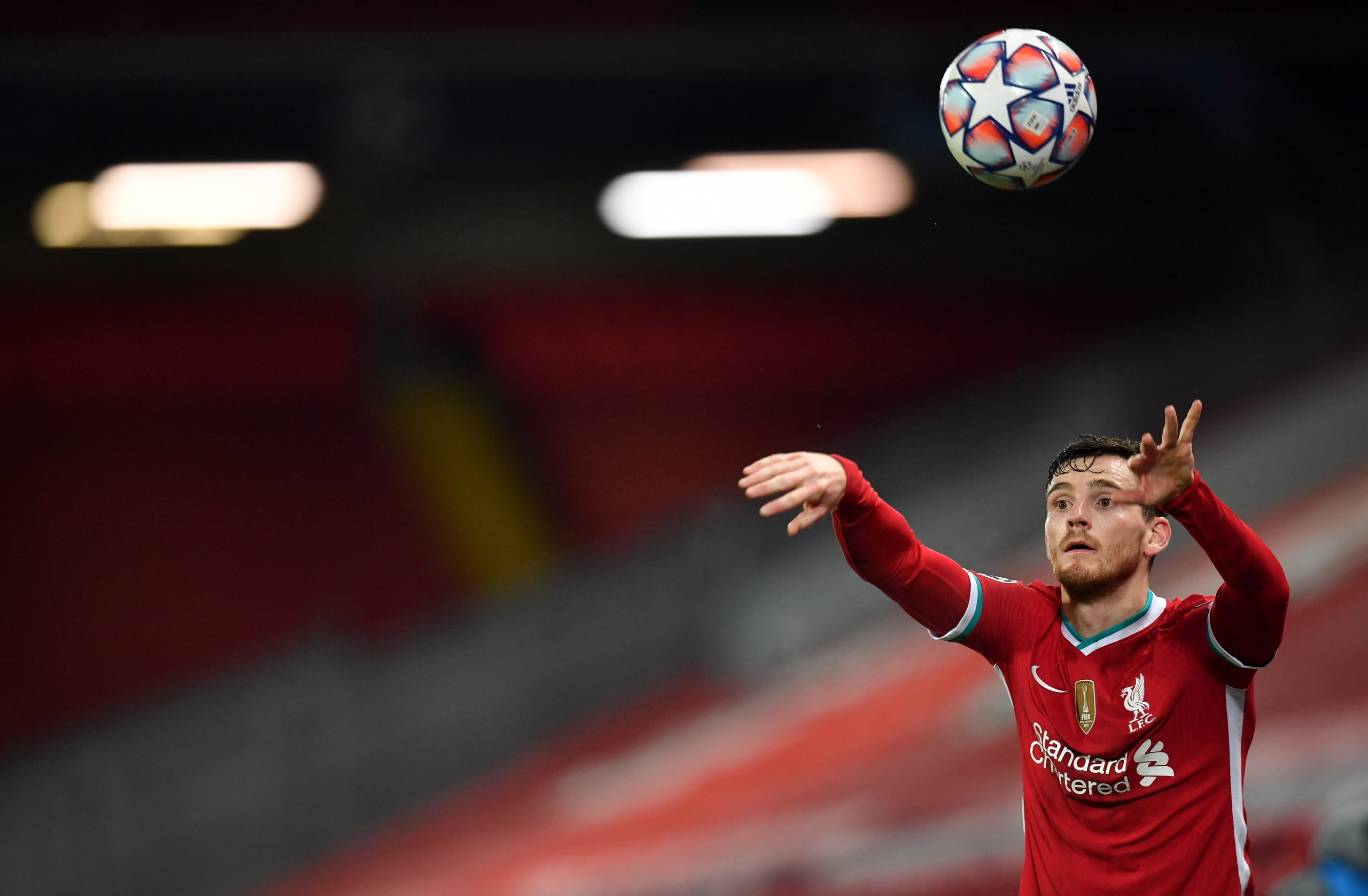 epa08856175 Andy Robertson of Liverpool makes a throw-in during the UEFA Champions League group D soccer match between Liverpool FC and Ajax Amsterdam in Liverpool, Britain, 01 December 2020.  EPA-EFE/Paul Ellis / POOL