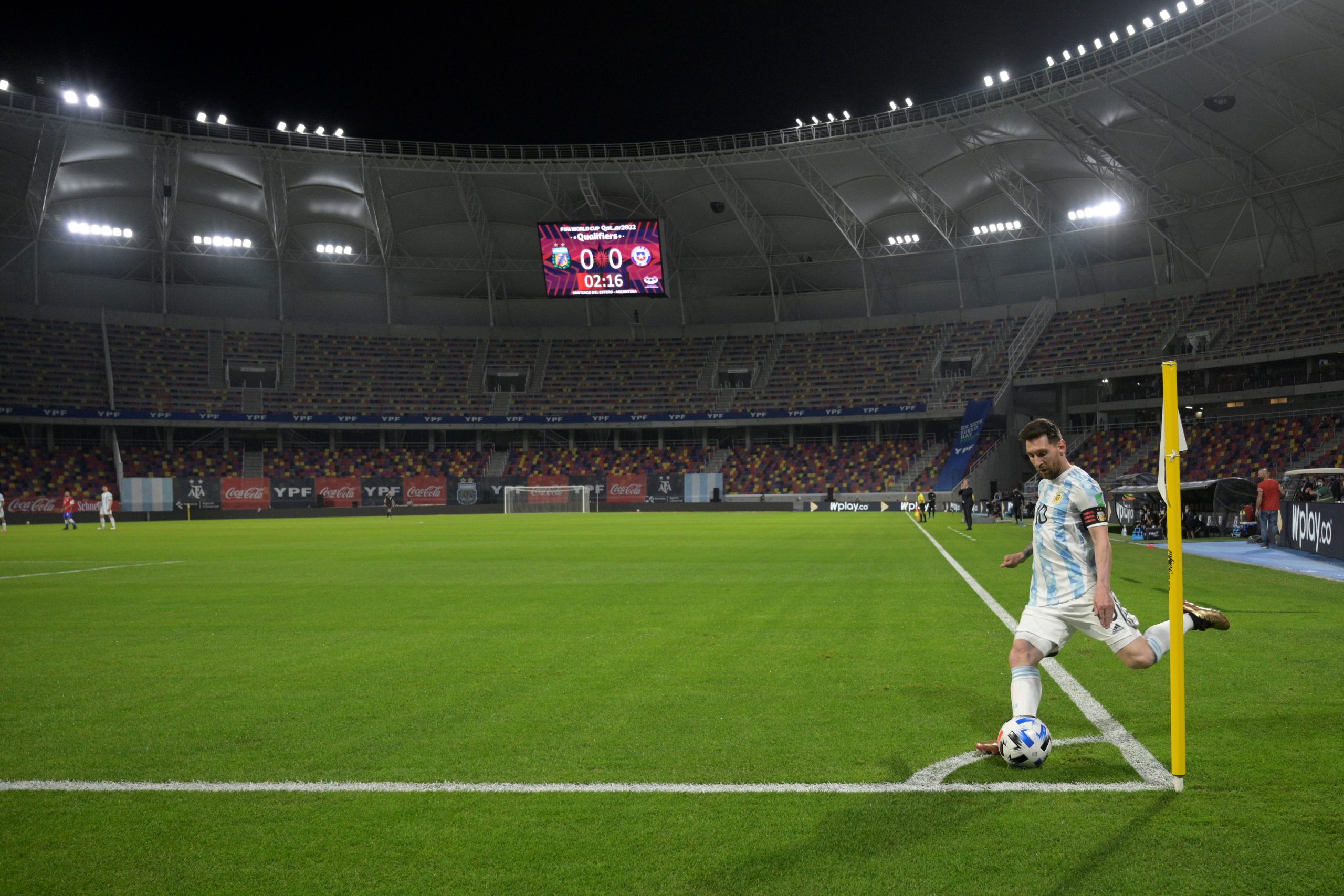 epa09246504 Argentina's Lionel Messi kicks a corner kick against Chile during the South American Qatar 2022 World Cup qualifier soccer match between Chile and Argentina in Santiago del Estero, Argentina, 03 June 2021.  EPA-EFE/Juan Mabromata / POOL