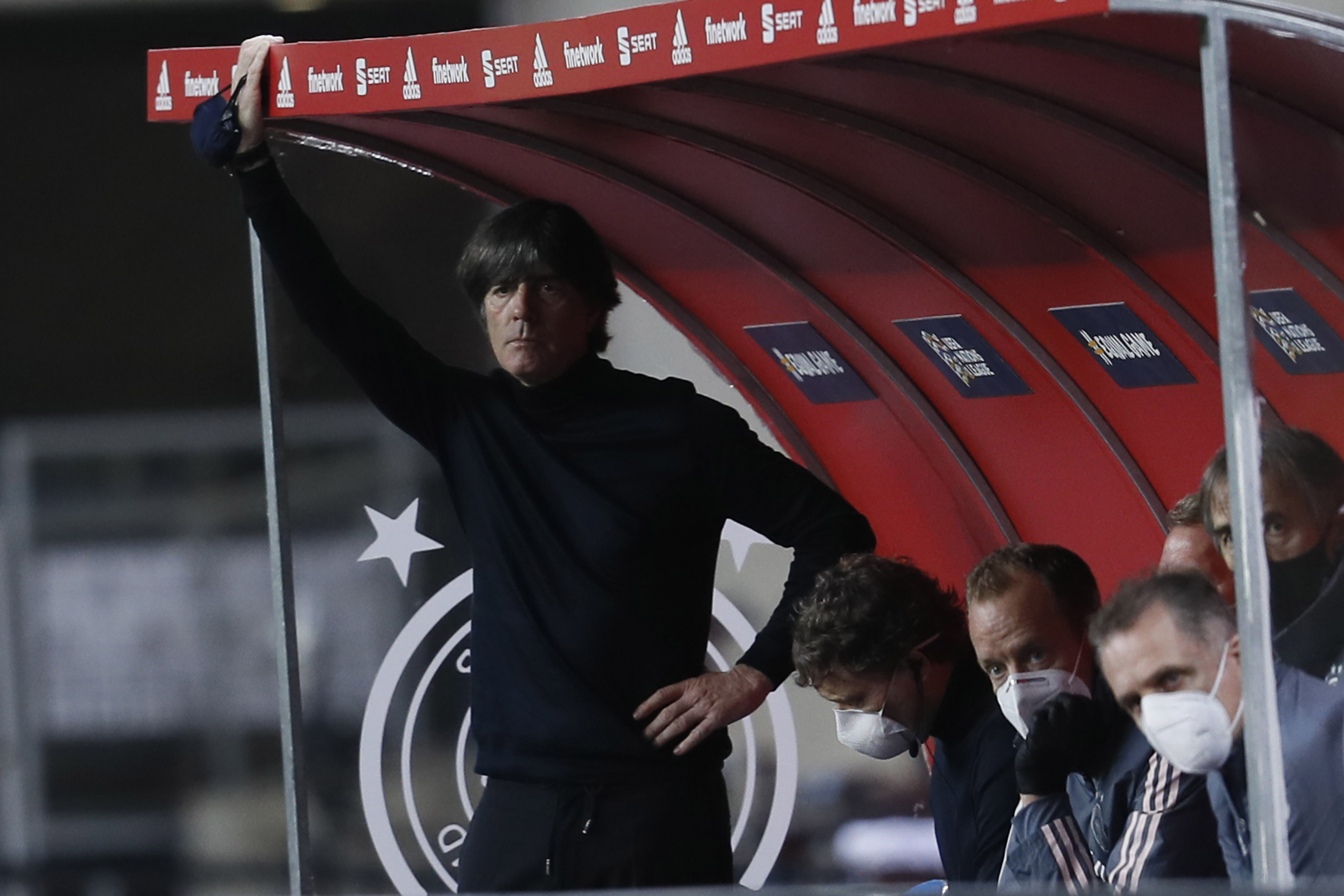 epa08826262 German national soccer team head coach Joachim Löw looks on during the UEFA Nations League soccer match, group 4, between Spain and Germany at La Cartuja Stadium in Sevilla, Spain, 17 November 2020.  EPA-EFE/Jose Manuel Vidal