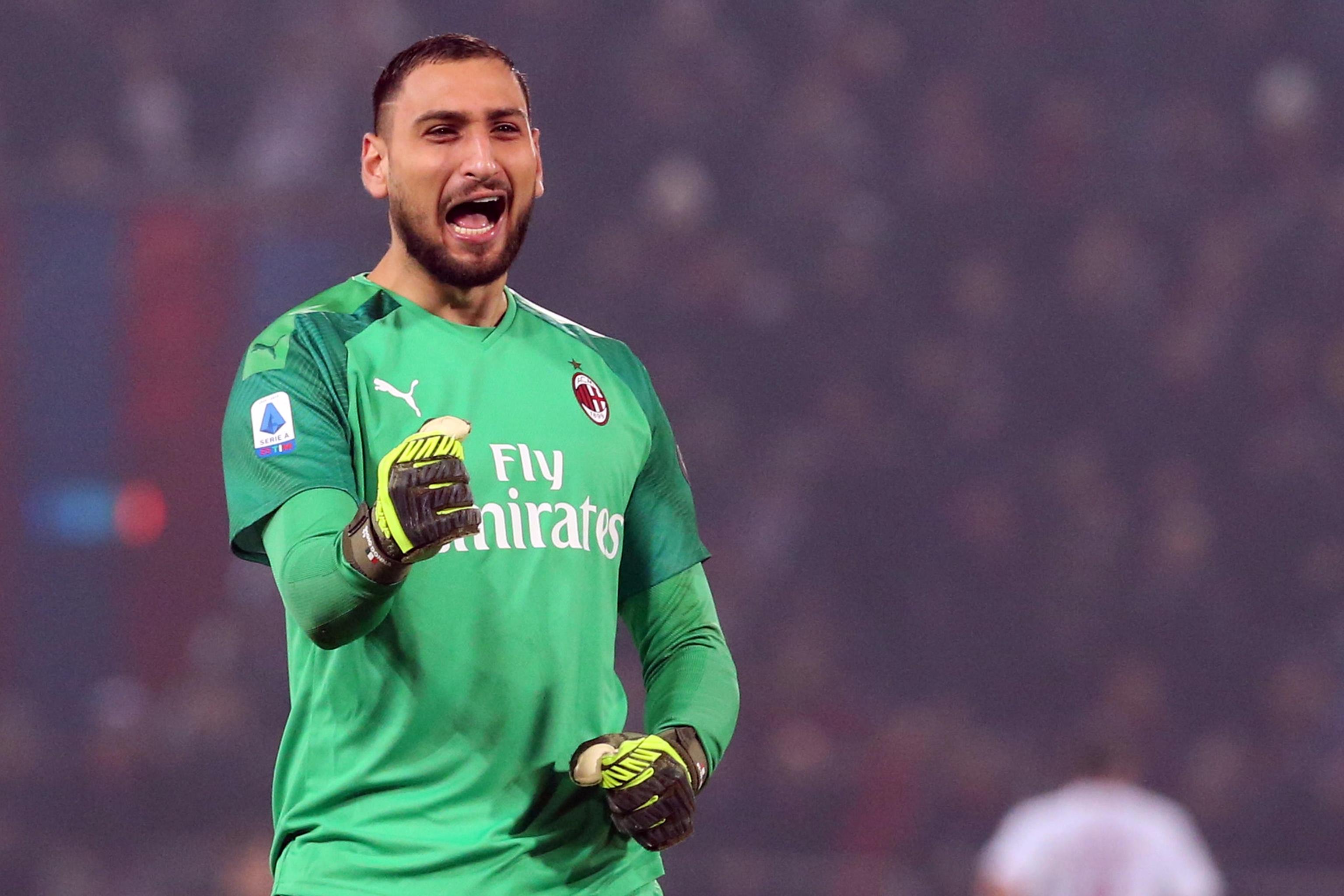 epa08055824 Milan's Gianluigi Donnarumma celebrates during the Italian Serie A soccer match Bologna FC vs AC Milan at the Renato Dall'Ara stadium in Bologna, Italy, 08 December 2019.  EPA-EFE/GIORGIO BENVENUTI