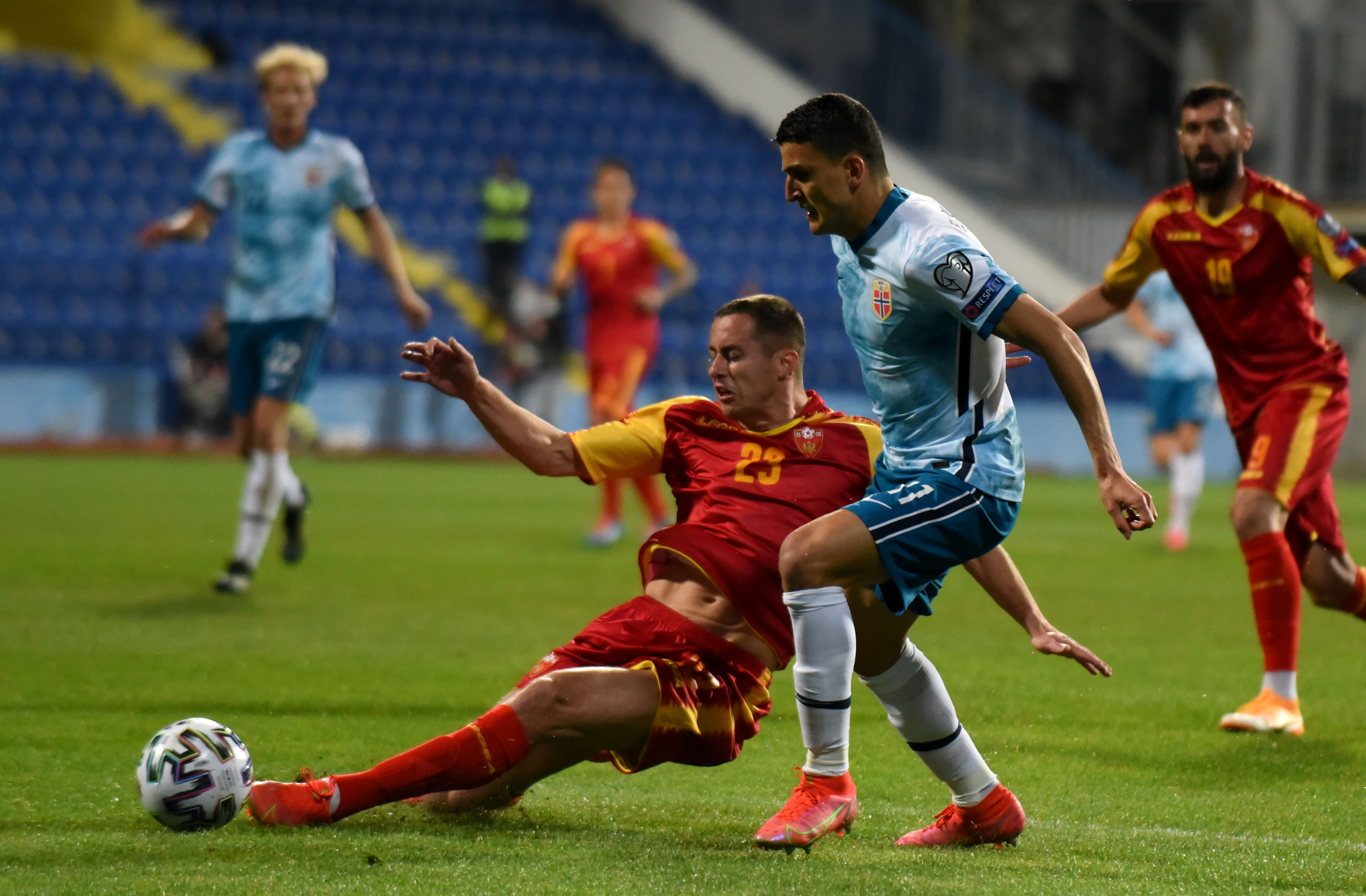 epa09107436 Norway?s Mohamed Elyounoussi (R) in action against Montenegro?s Adan Marusic (L) during the FIFA World Cup 2022 qualifying soccer match between Montenegro and Norway in Podgorica, Montenegro, 30 March 2021.  EPA-EFE/BORIS PEJOVIC