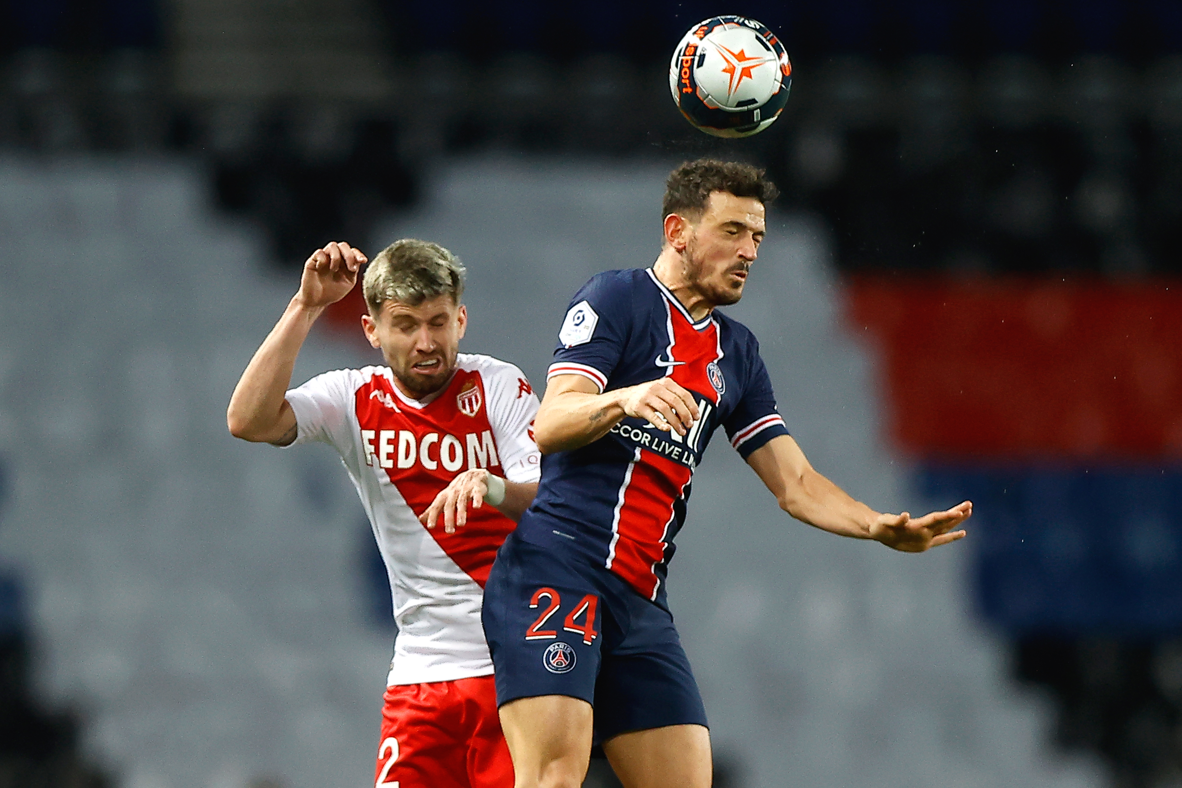 epa09028783 Paris Saint-Germain's Alessandro Florenzi (R) and Caio Henrique (L) of Monaco in action during the French Ligue 1 soccer match between Paris Saint-Germain (PSG) and AS Monaco in Paris, France, 21 February 2021.  EPA-EFE/IAN LANGSDON