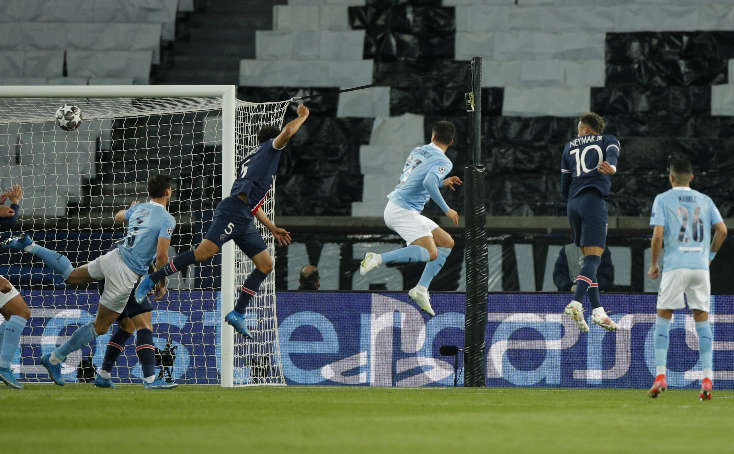 epa09165947 Paris Saint Germain's Marquinhos (2-L) scores a goal during the UEFA Champions League semi final, first leg soccer match between PSG and Manchester City at the Parc des Princes stadium in Paris, France, 28 April 2021.  EPA-EFE/YOAN VALAT