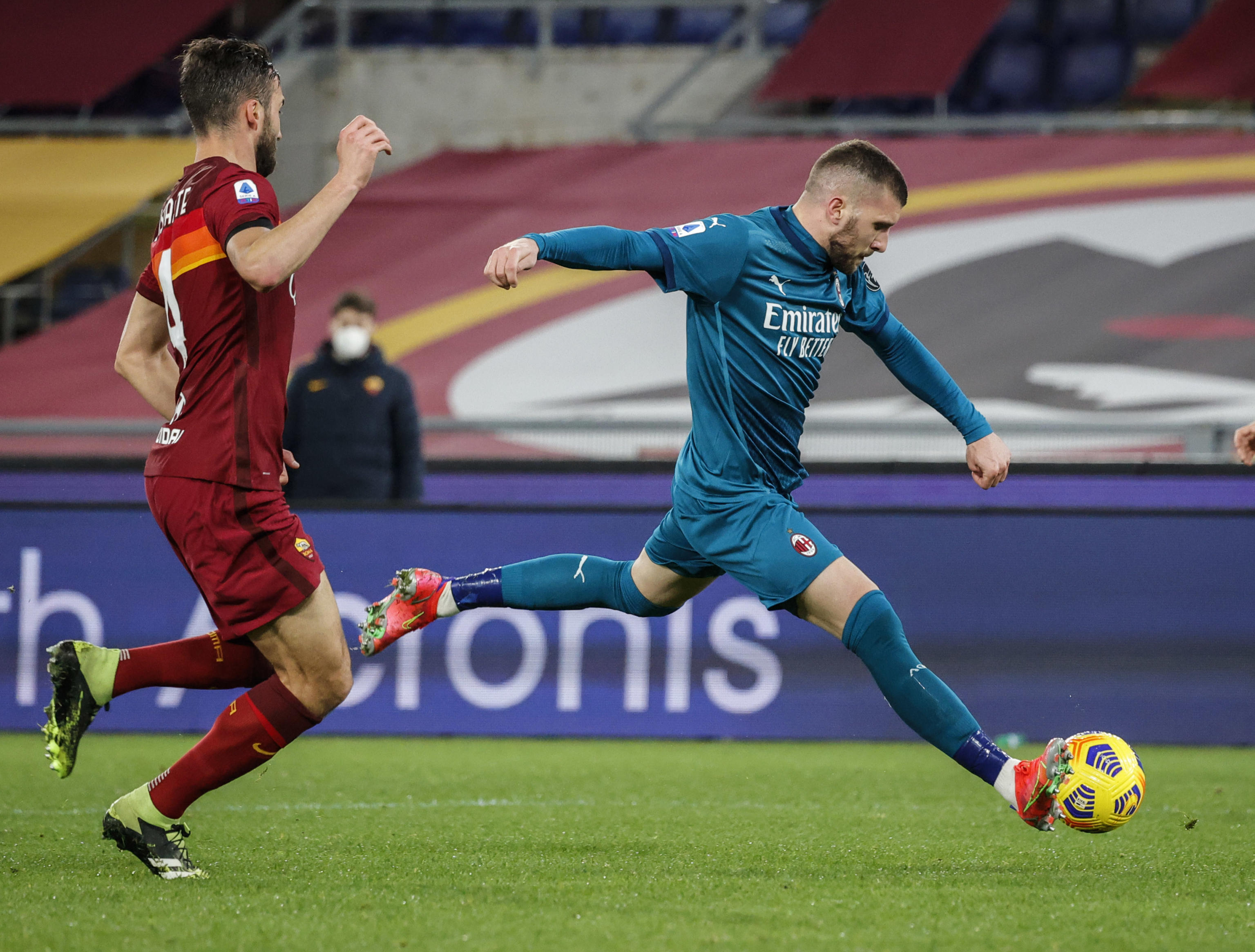 epa09043552 Milan?s Ante Rebic takes a shot at goal during the Italian Serie A soccer match between AS Roma and AC Milan at the Olimpico stadium in Rome, Italy, 28 February 2021.  EPA-EFE/GIUSEPPE LAMI