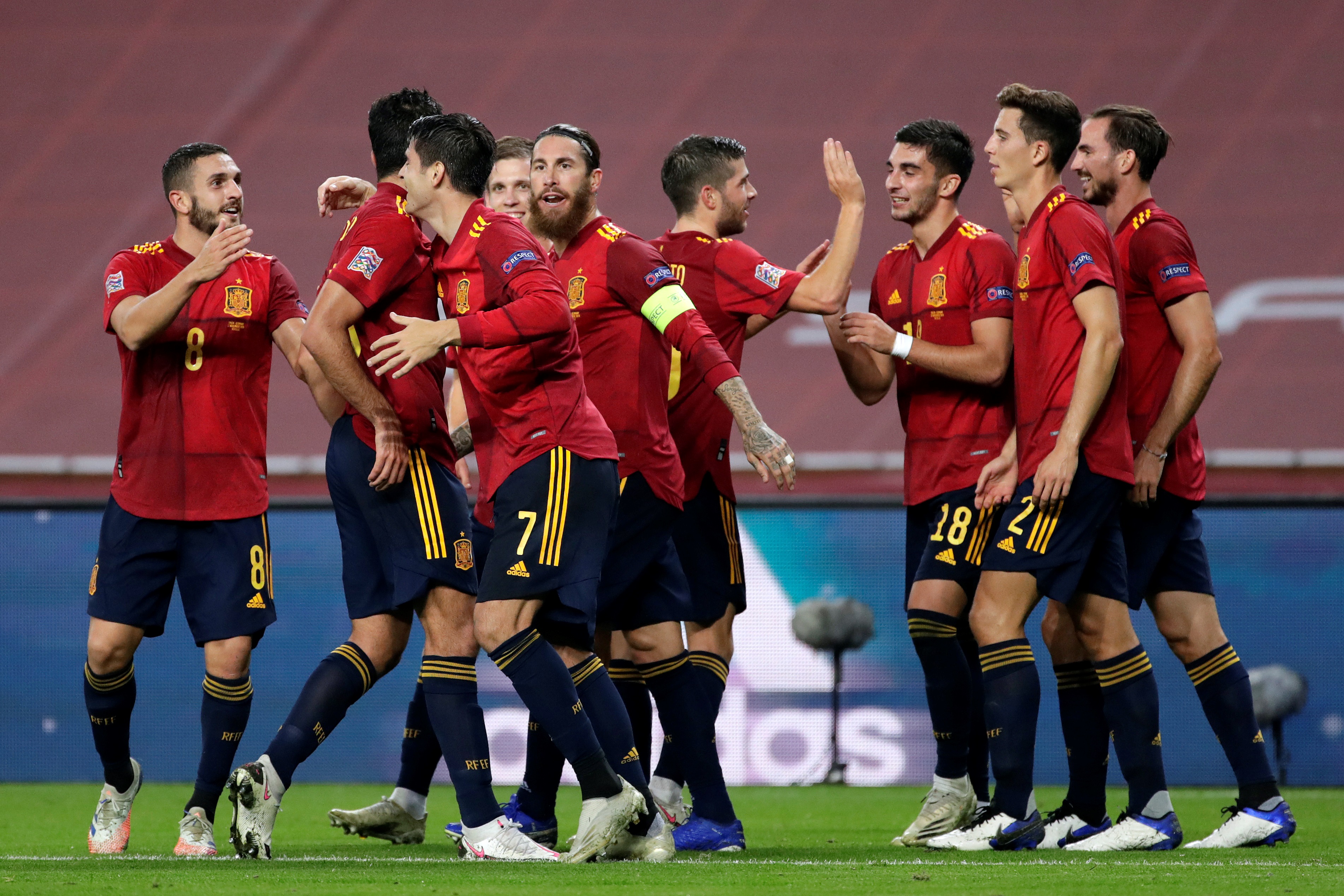 epa08826142 Spanish national soccer team players celebrate the 0-3 lead against Germany, during the UEFA Nations League soccer match, group 4, between Spain and Germany at La Cartuja Stadium in Sevilla, Spain, 17 November 2020.  EPA-EFE/Julio Munoz