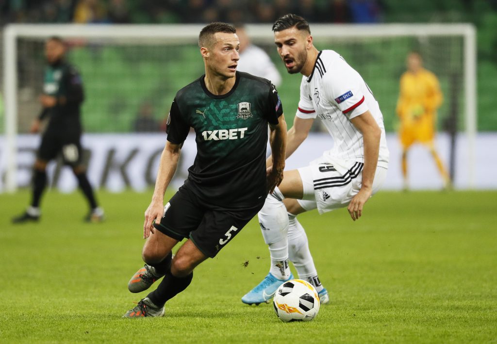 epa08031079 Uros Spajic (L) of Krasnodar in action against Kemal Ademi (R) of Basel during the UEFA Europa League group stage soccer match between FK Krasnodar and FC Basel in Krasnodar, Russia, 28 November 2019.  EPA-EFE/YURI KOCHETKOV