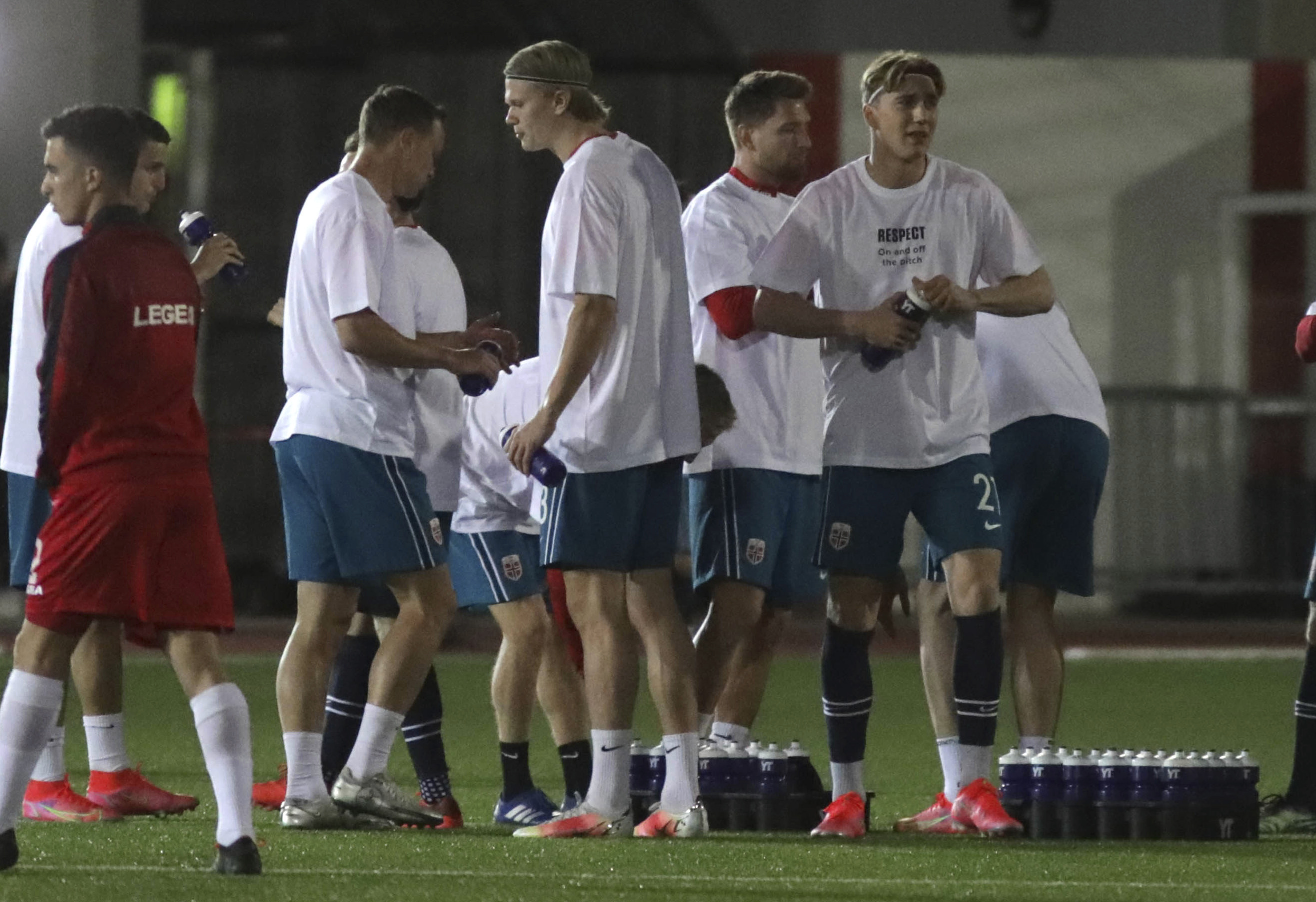 Norway players warm up ahead of the World Cup 2022 group G qualifying soccer match between Gibraltar and Norway in Gibraltar, Wednesday March 24, 2021. (AP Photo/Javier Fergo)