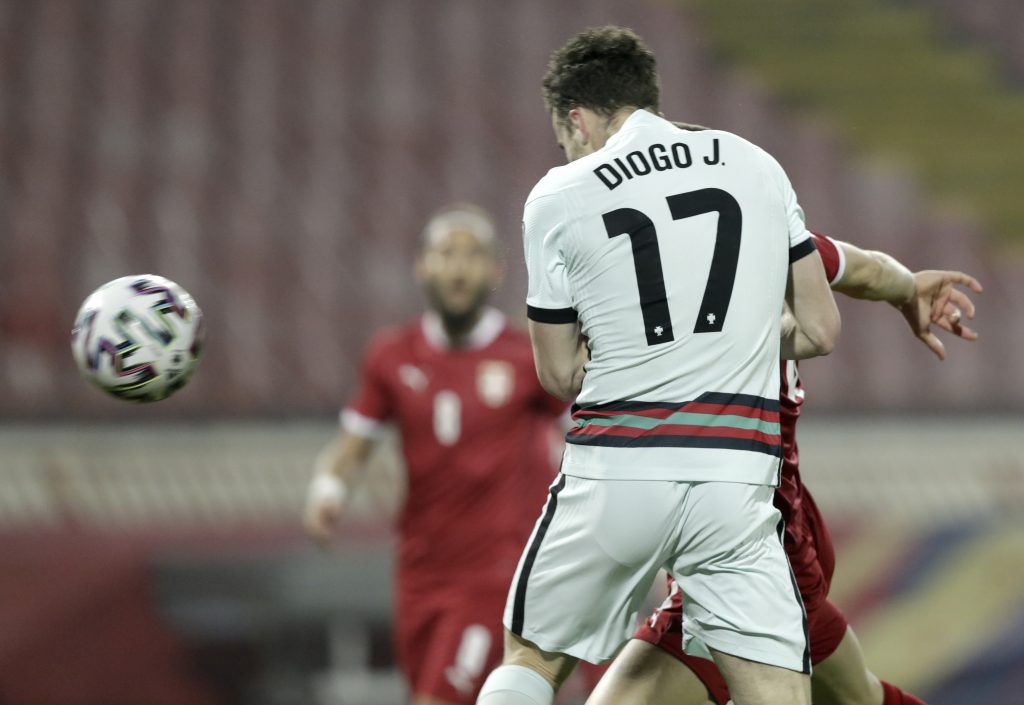 epa09101961 Portugal?s Diogo Jota scores opening goal during the FIFA World Cup 2022 qualifying soccer match between Serbia and Portugal in Belgrade, Serbia, 27 March 2021.  EPA-EFE/Andrej Cukic