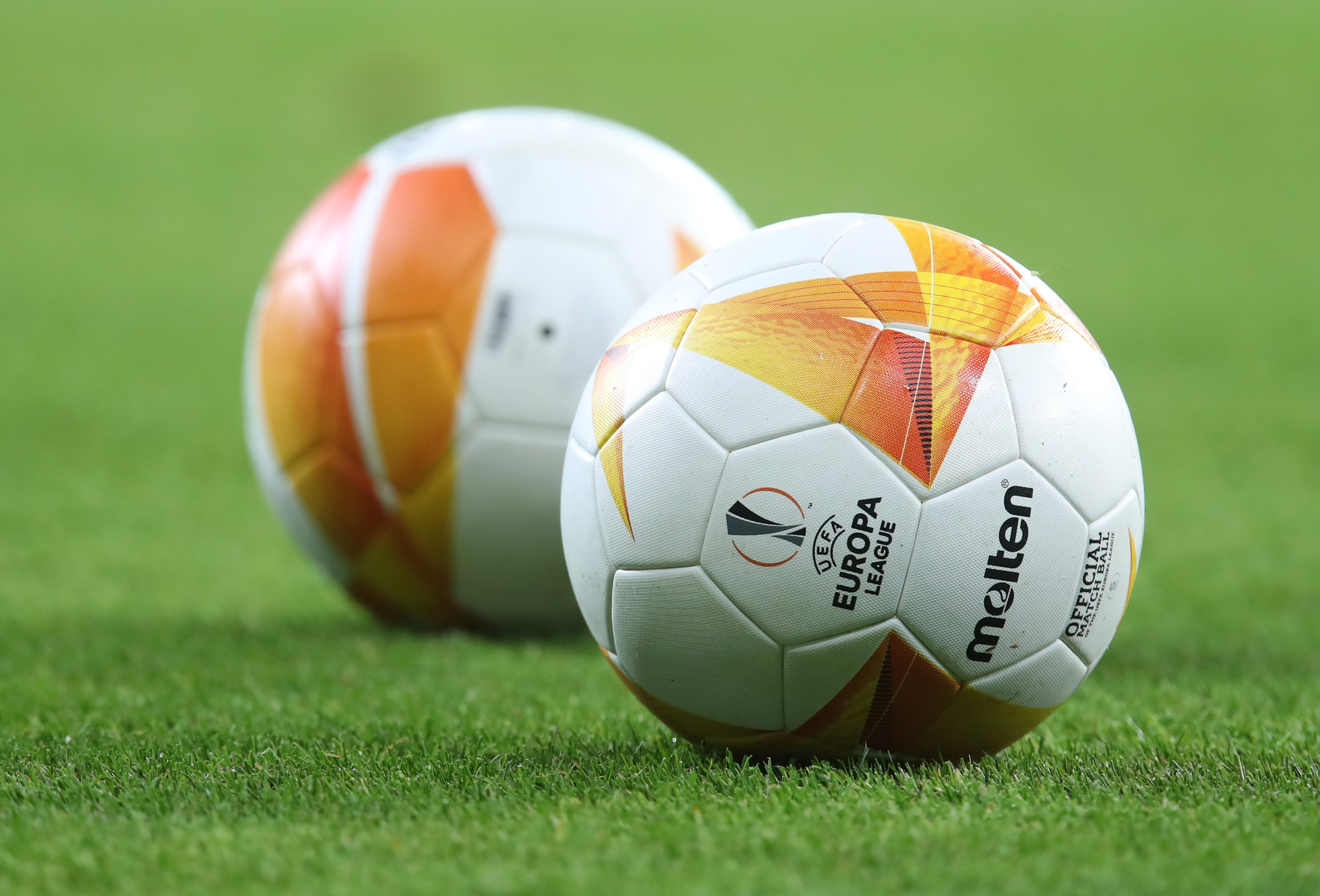 epa08876455 Molten matchballs are pictured prior to the UEFA Europa League Group L soccer match between TSG Hoffenheim and KAA Gent at PreZero-Arena in Sinsheim, Germany, 10 December 2020.  EPA-EFE/ALEX GRIMM / POOL