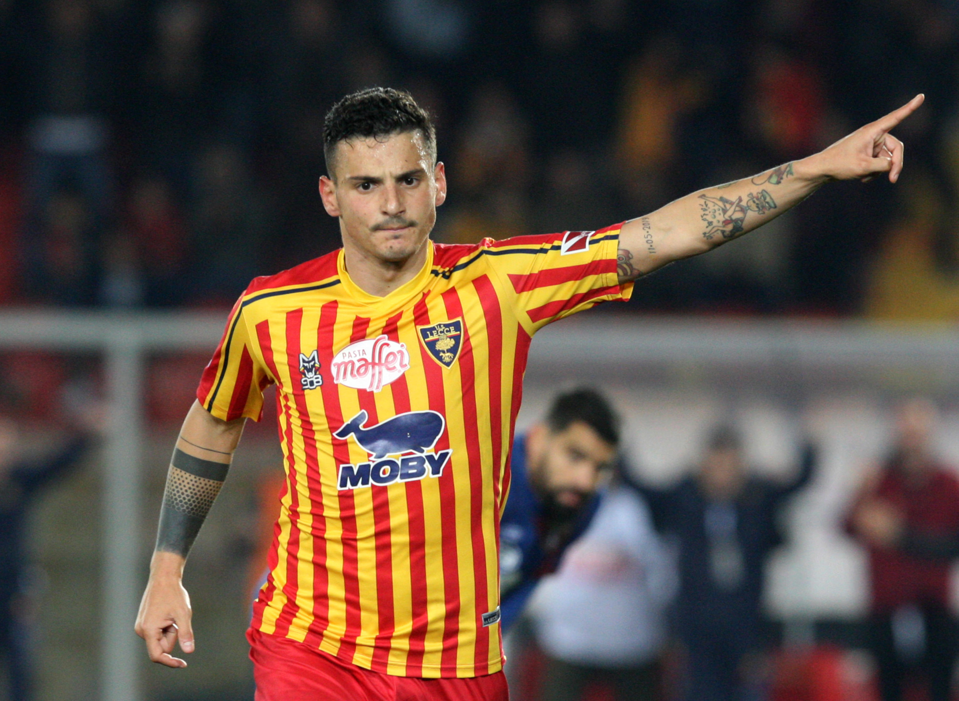 epa08188574 Lecce's Filippo Falco celebrates after scoring the 3-0 goal during the Italian Serie A soccer match US Lecce vs Torino FC at the Via del Mare stadium in Lecce, Italy, 02 February 2020.  EPA-EFE/MARCO LEZZI