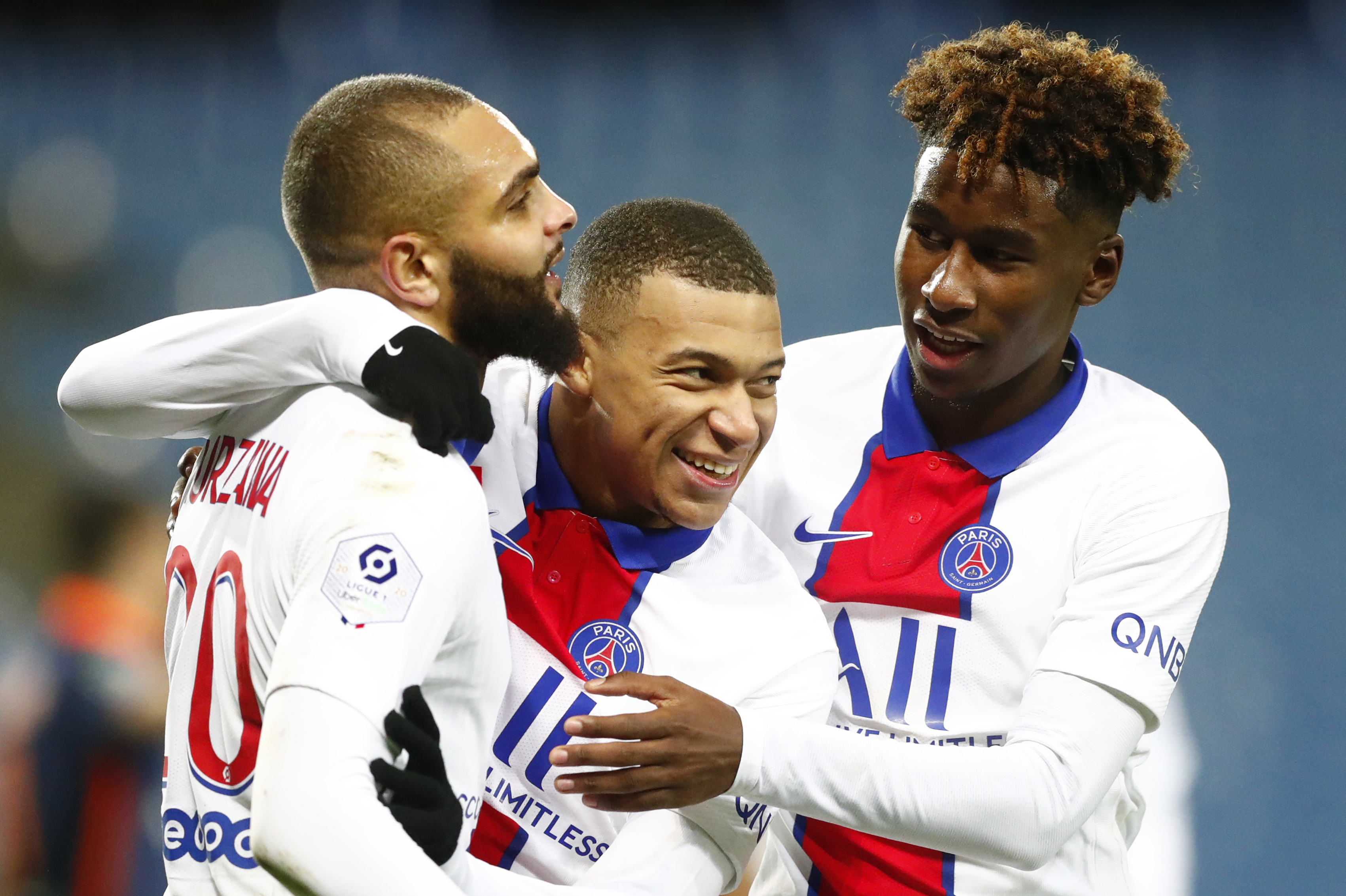 epa08865384 Kylian Mbappe (C) of Paris Saint Germain celebrates a goal during the French Ligue 1 soccer match between Montpellier HSC and Paris Saint Germain, in Montpellier, France, 05 December 2020.  EPA-EFE/Guillaume Horcajuelo