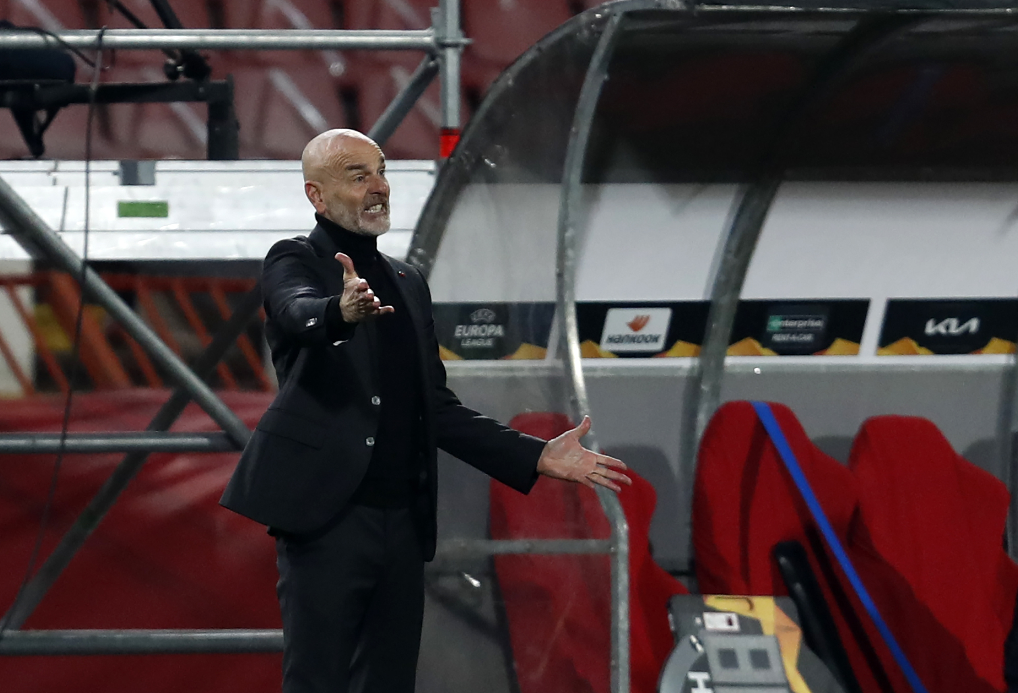 AC Milan's manager Stefano Pioli reacts during the Europa League round of 32 first leg soccer match between Red Star and AC Milan at the Rajko Mitic Stadium in Belgrade, Serbia, Thursday, Feb. 18, 2021. (AP Photo/Darko Vojinovic)