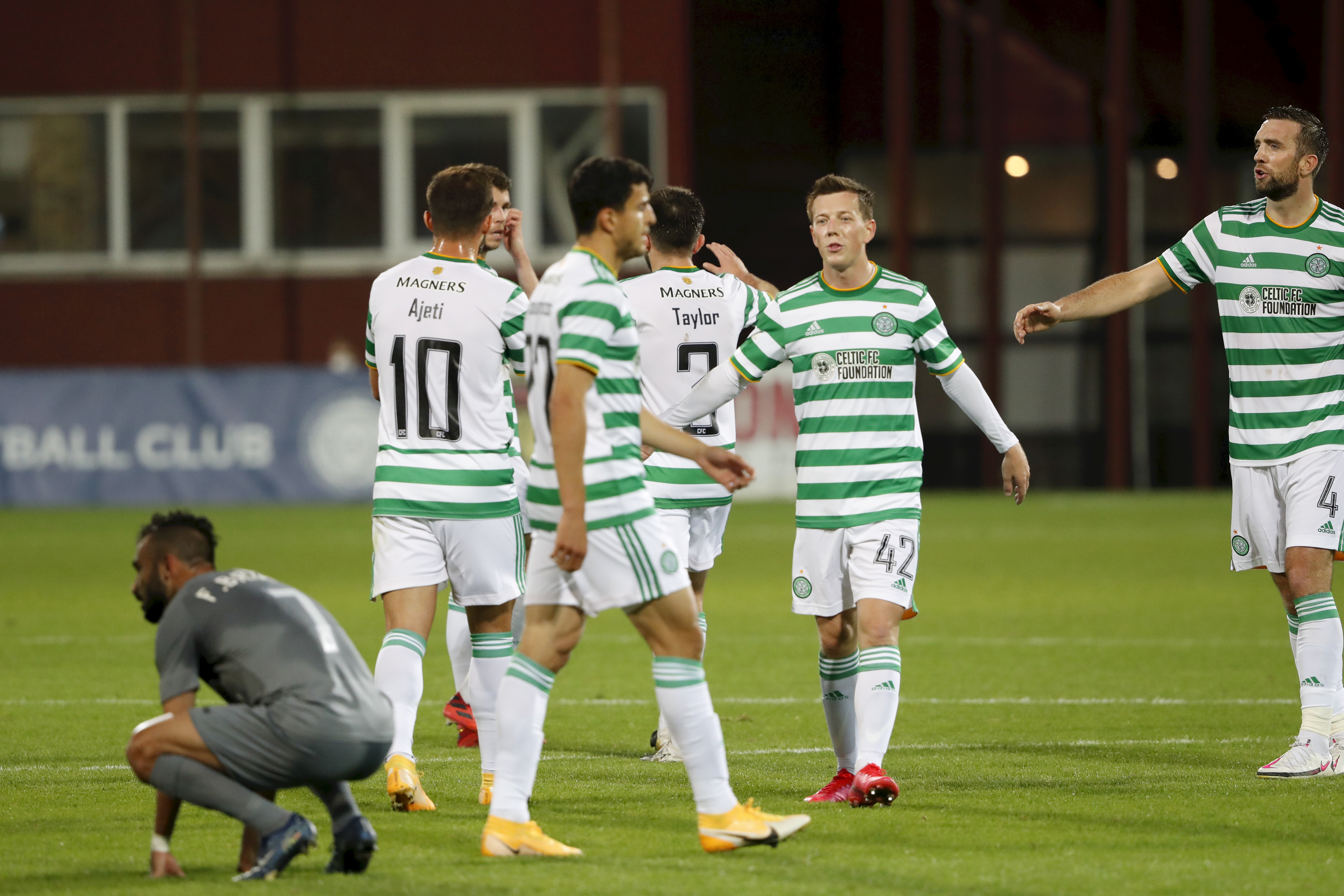 epa08694605 Players of Celtic celebrate their 1-0 lead during the UEFA Europa League third qualifying round soccer match between FK Riga and Celtic Glasgow at the Daugava stadium in Riga, Latvia, 24 September 2020.  EPA-EFE/TOMS KALNINS