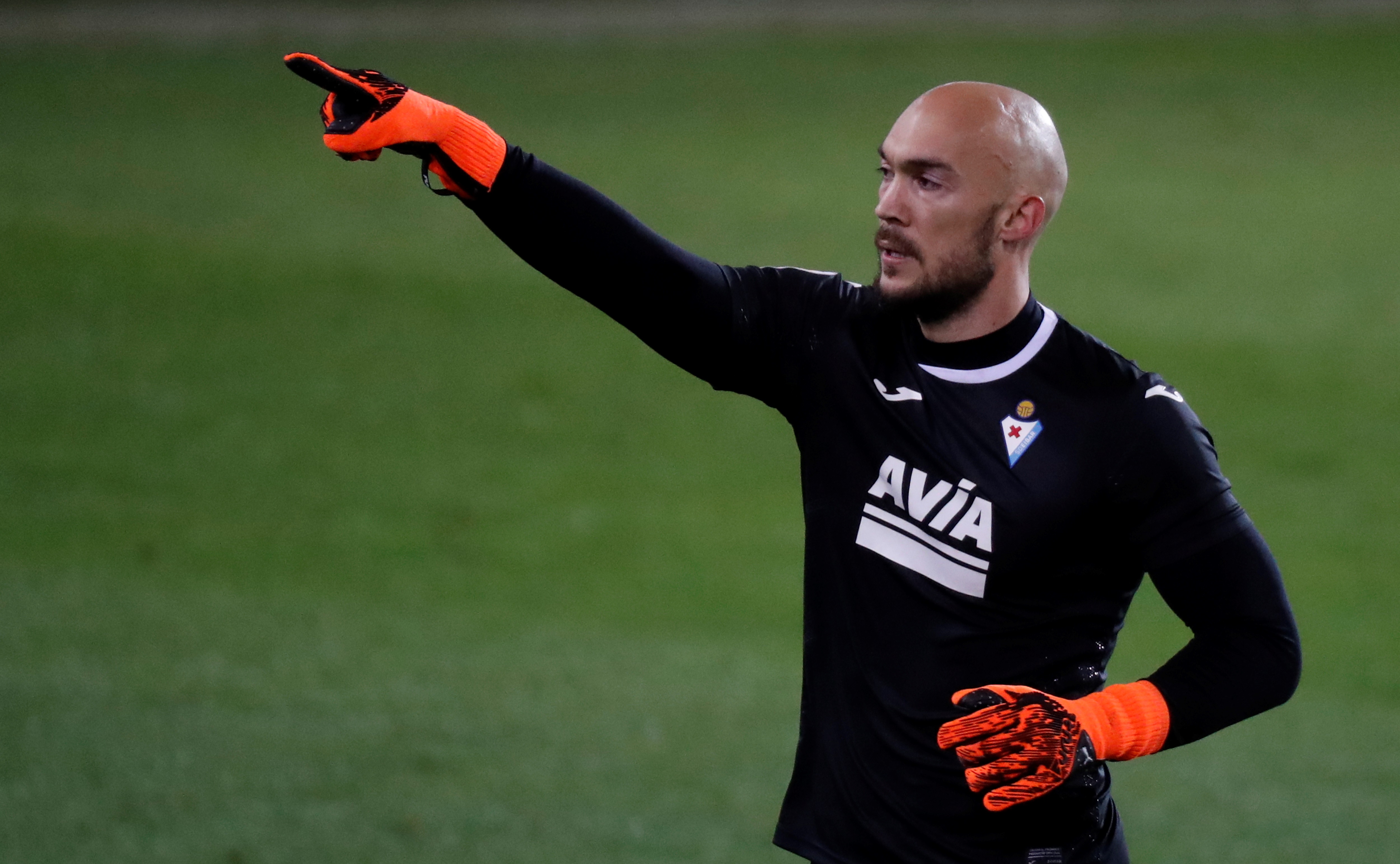 epa08956489 Eibar's goalkeeper Marko Dmitrovic reacts during the Spanish LaLiga soccer match between SD Eibar and Atletico de Madrid at Ipurua stadium in Eibar, Basque Country, Spain, 21 January 2021.  EPA-EFE/Javier Etxezarreta