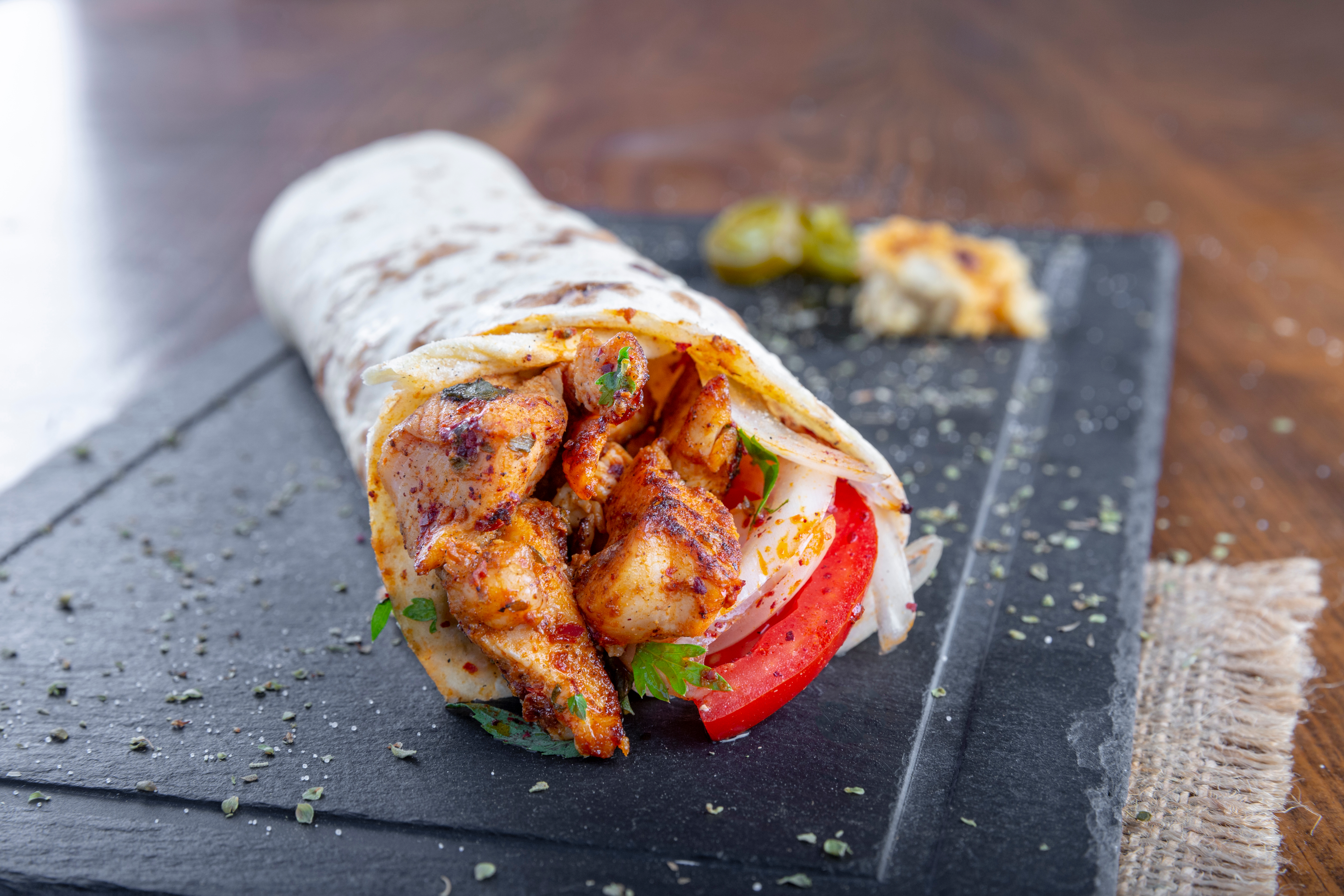 Delicious,Grilled,Chicken,Kebab,Wrap,With,Onion,Tomato,And,Parsley