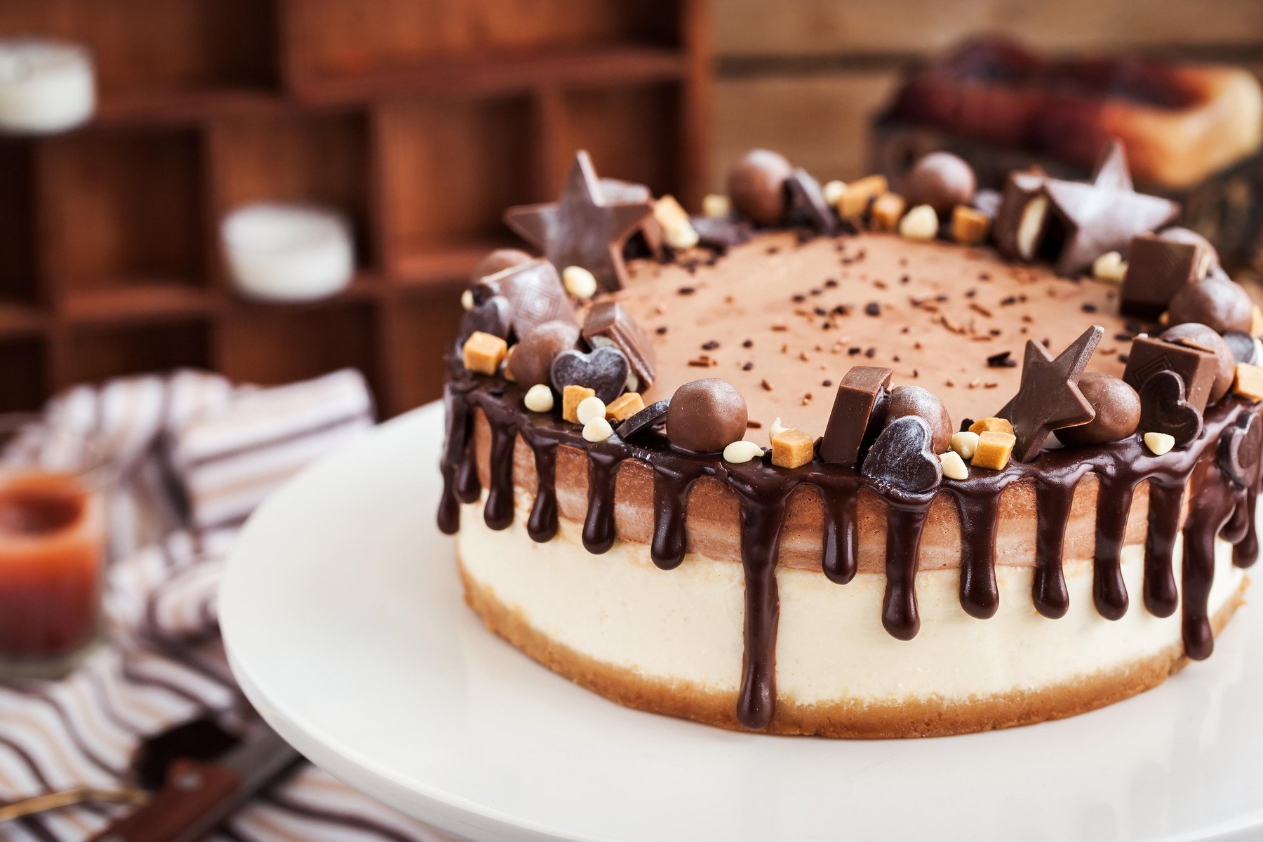 Delicious two-ply chocolate cheesecake decorated with candies and frosting,Image: 306769588, License: Royalty-free, Restrictions: , Model Release: no, Credit line: Ekaterina Smirnova / Alamy / Alamy / Profimedia