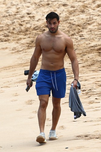 EXCLUSIVE: Britney Spear's boyfriend Sam Asghari takes a solo stroll on the beach while on vacation in Maui