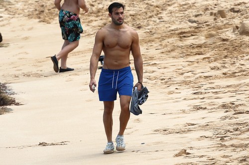 EXCLUSIVE: Britney Spear's boyfriend Sam Asghari takes a solo stroll on the beach while on vacation in Maui
