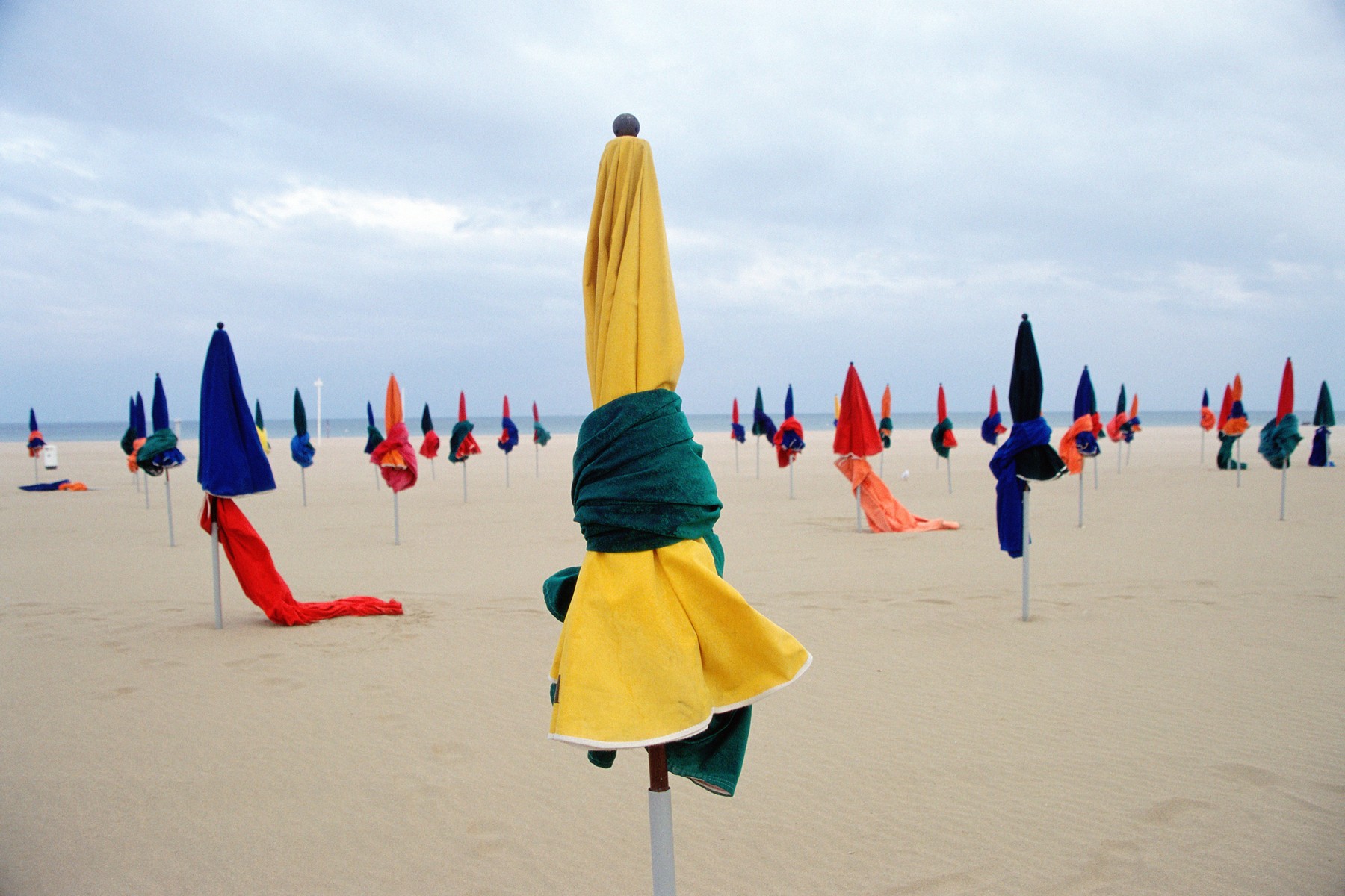 Umbrellas on empty beach