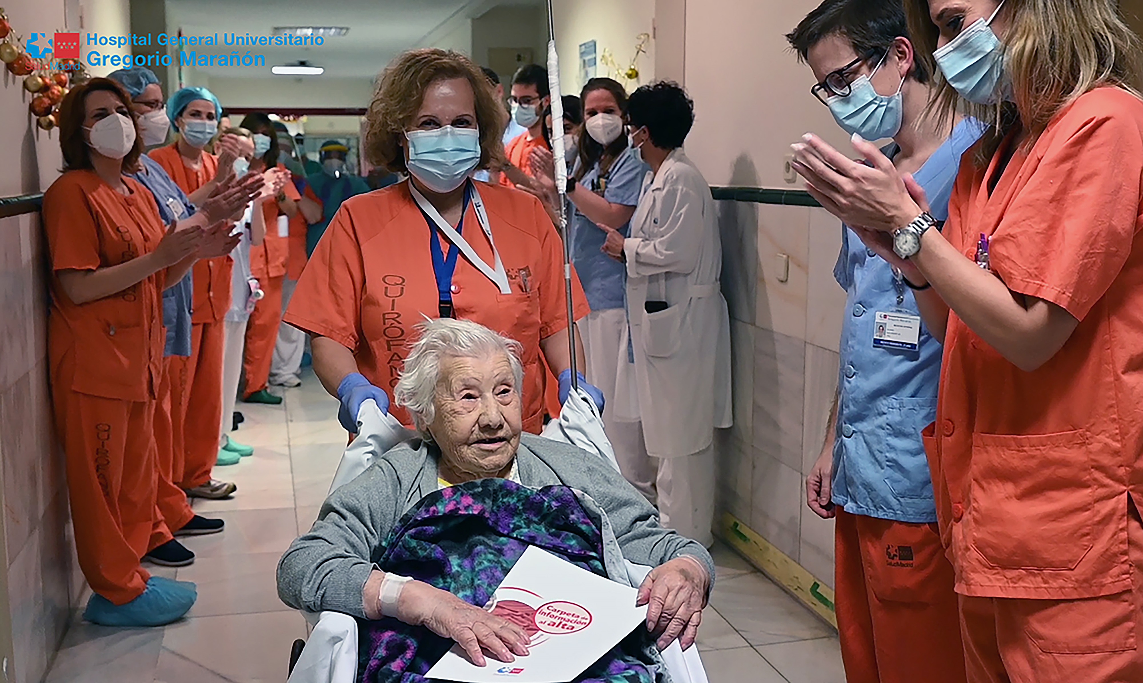 A 104-year old woman is discharged from hospital after recovering from COVID-19 virus disease