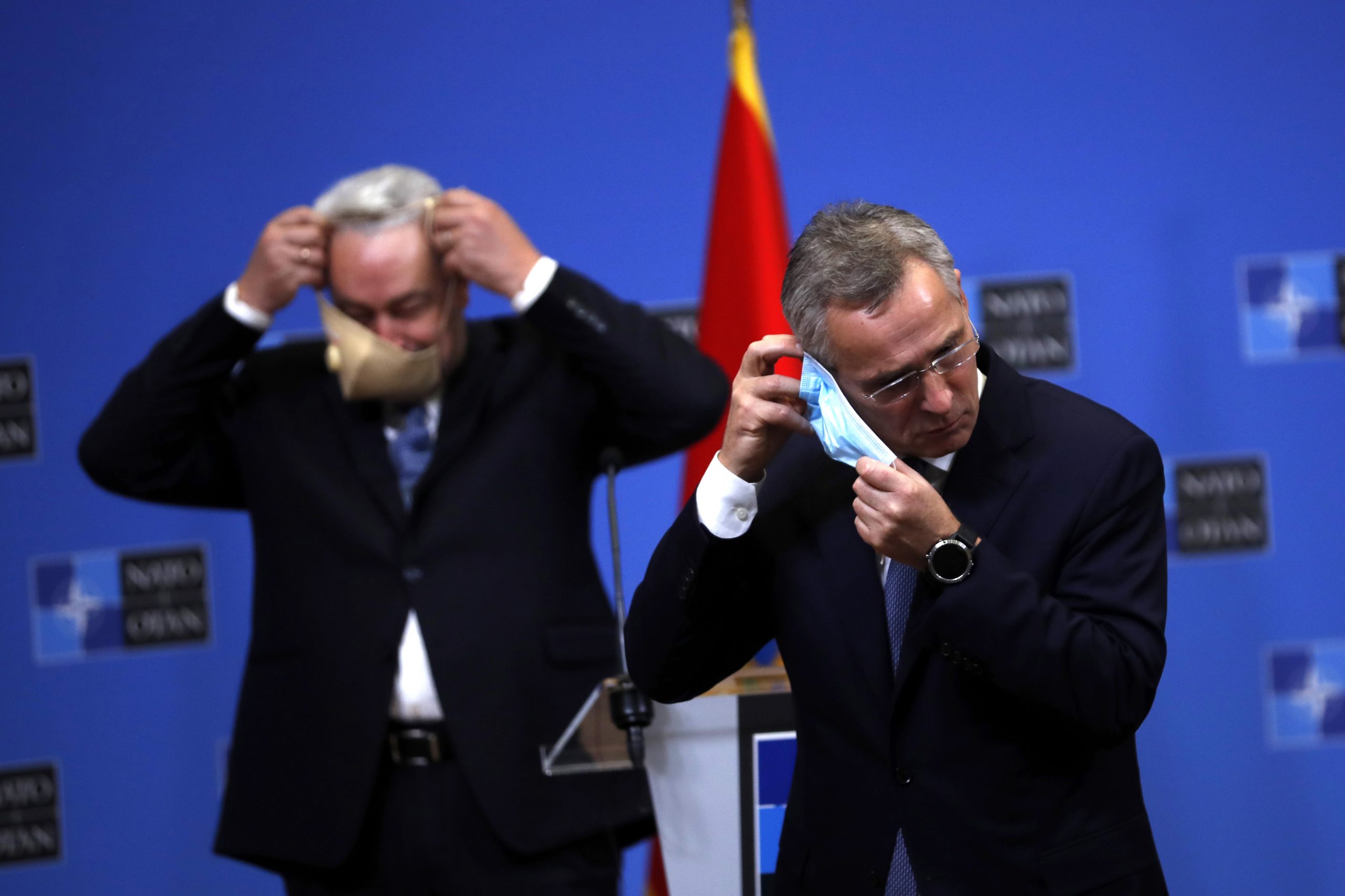 epa08885447 NATO Secretary General Jens Stoltenberg (R) and Montenegro Prime Minister Zdravko Krivokapic (L) give a joint press conference following their talks at the NATO headquarters in Brussels, Belgium, 15 Decmber 2020.  EPA-EFE/Francisco Seco / POOL