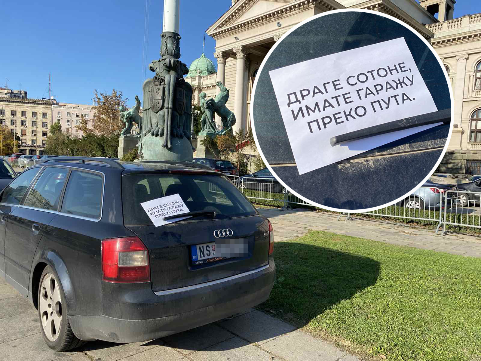 Bahato parkirani automobili ispred skupstine Srbije, na njih je neko nakacio papir sa natpisom " Drage sotone imate garazu preko puta "