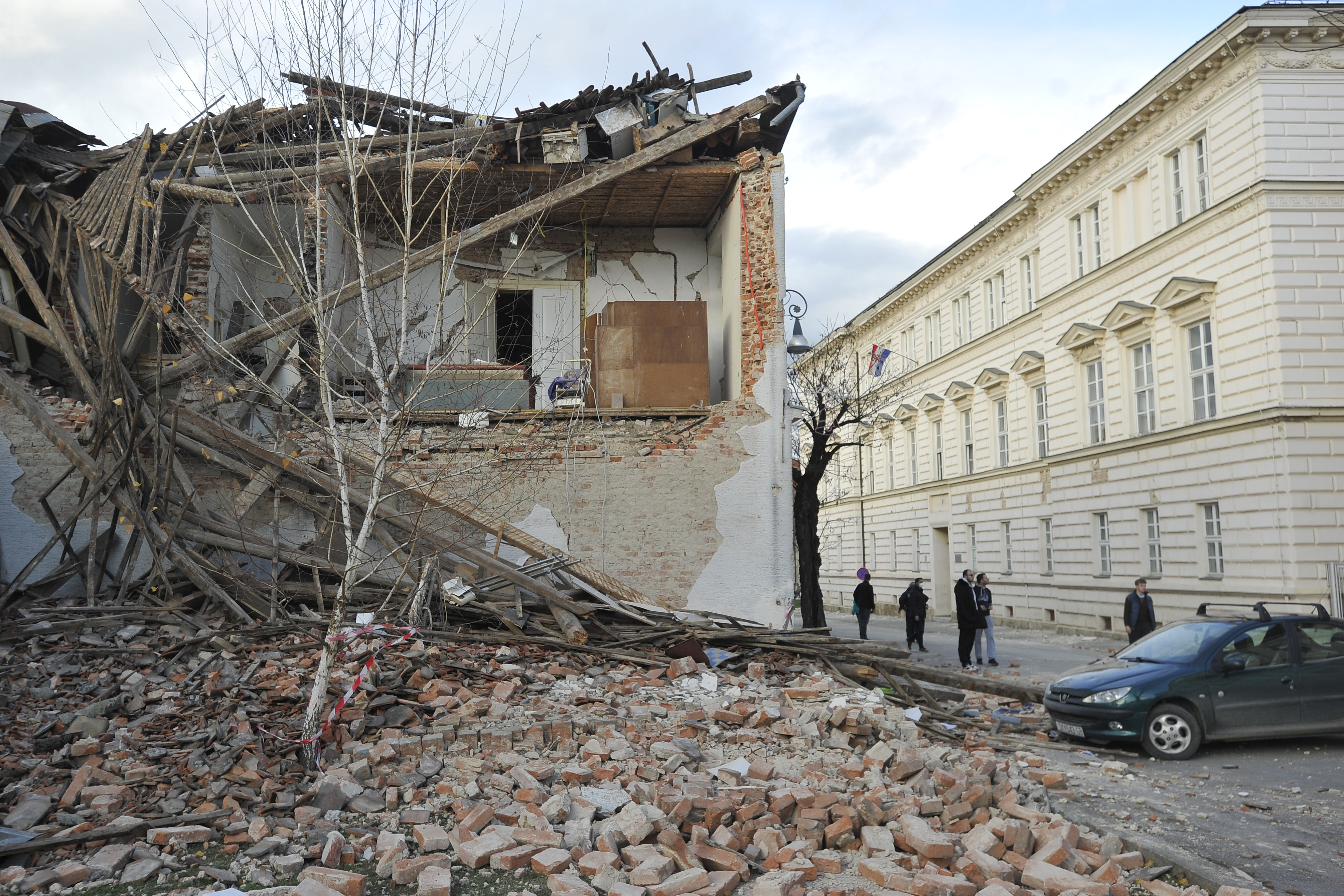 A view of buildings damaged in an earthquake, in Petrinja, Croatia, Tuesday, Dec. 29, 2020. A strong earthquake has hit central Croatia and caused major damage and at least one death in a town southeast of the capital. (AP Photo)