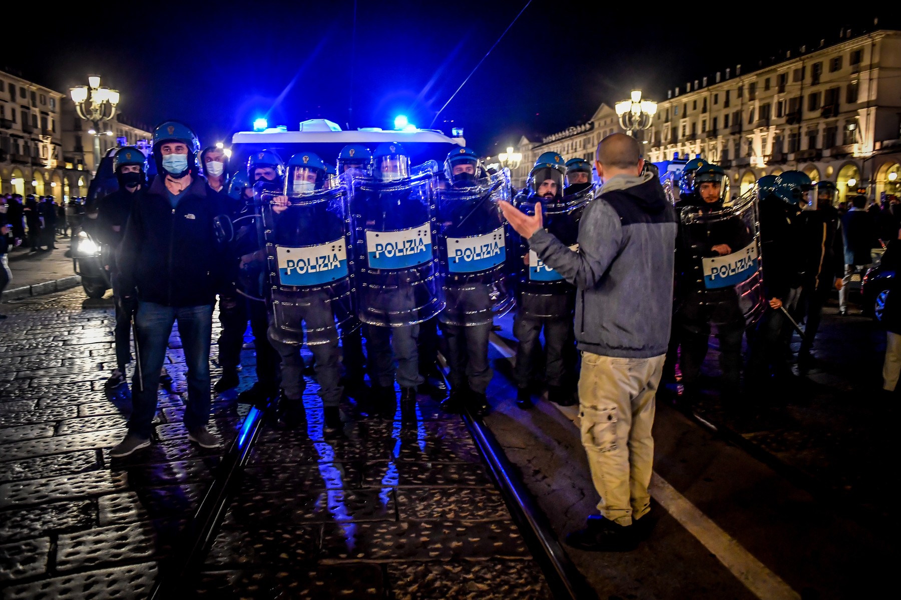 Italy: Protesters clash with police as they march against new Covid-19 restrictions
