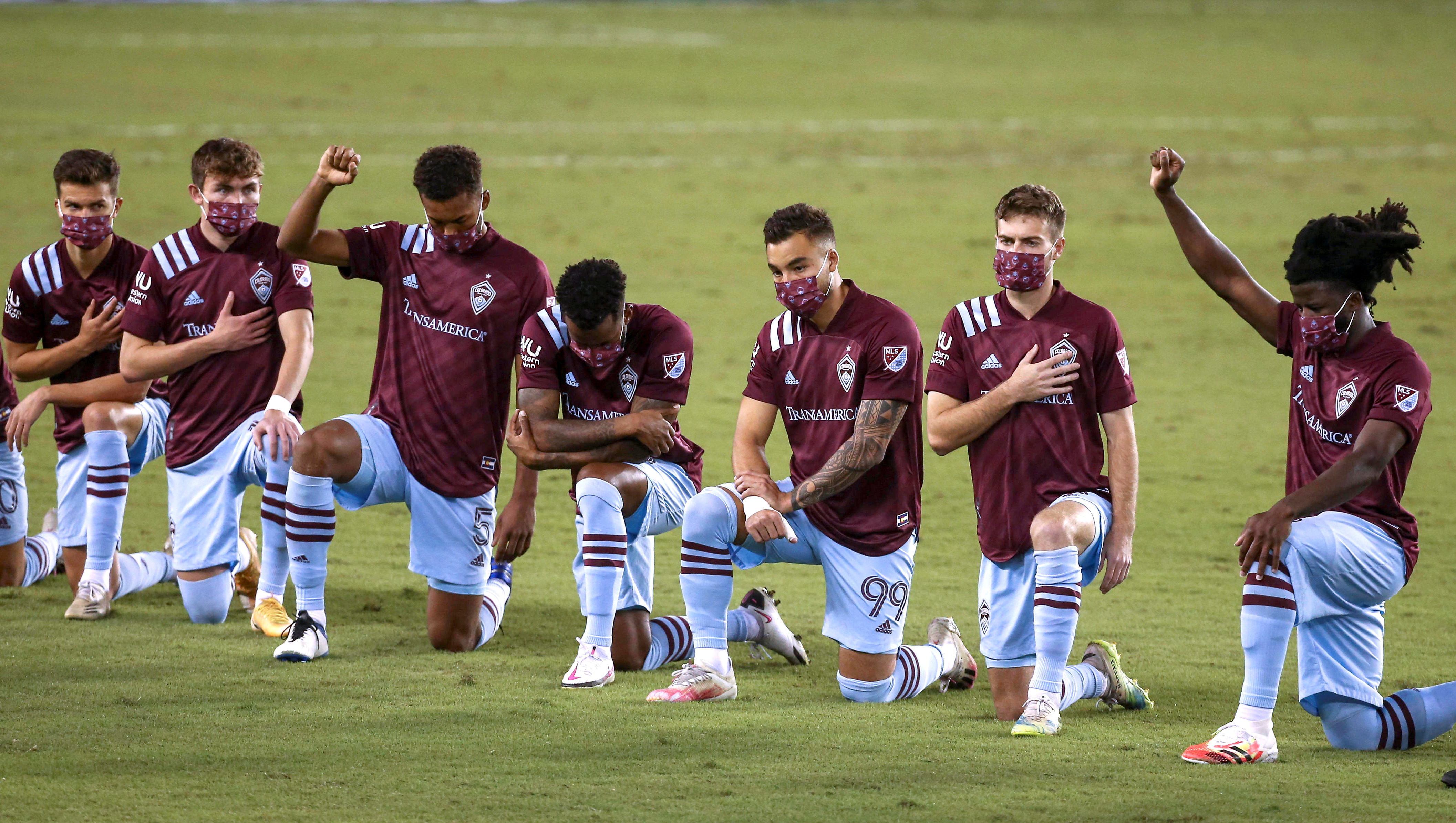 Nov 8, 2020; Houston, Texas, USA; Colorado Rapids players kneel during the national anthem before a match against the Houston Dynamo at BBVA Stadium. Mandatory Credit: Troy Taormina-USA TODAY Sports     TPX IMAGES OF THE DAY