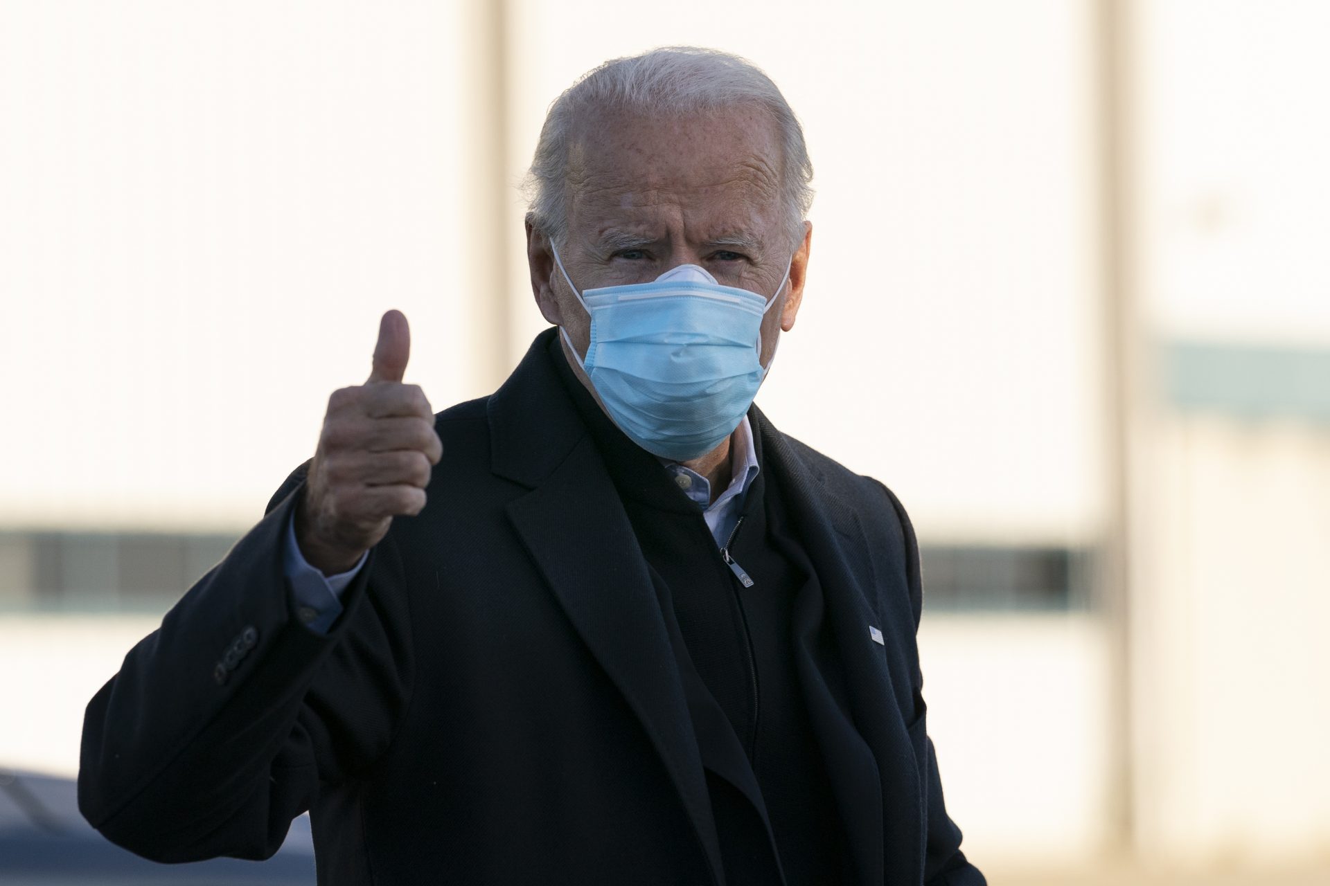 Democratic presidential candidate former Vice President Joe Biden gives the thumbs up as he boards his campaign plane at New Castle Airport in New Castle, Del., Tuesday, Nov. 3, 2020, en route to Scranton, Pa. (AP Photo/Carolyn Kaster)