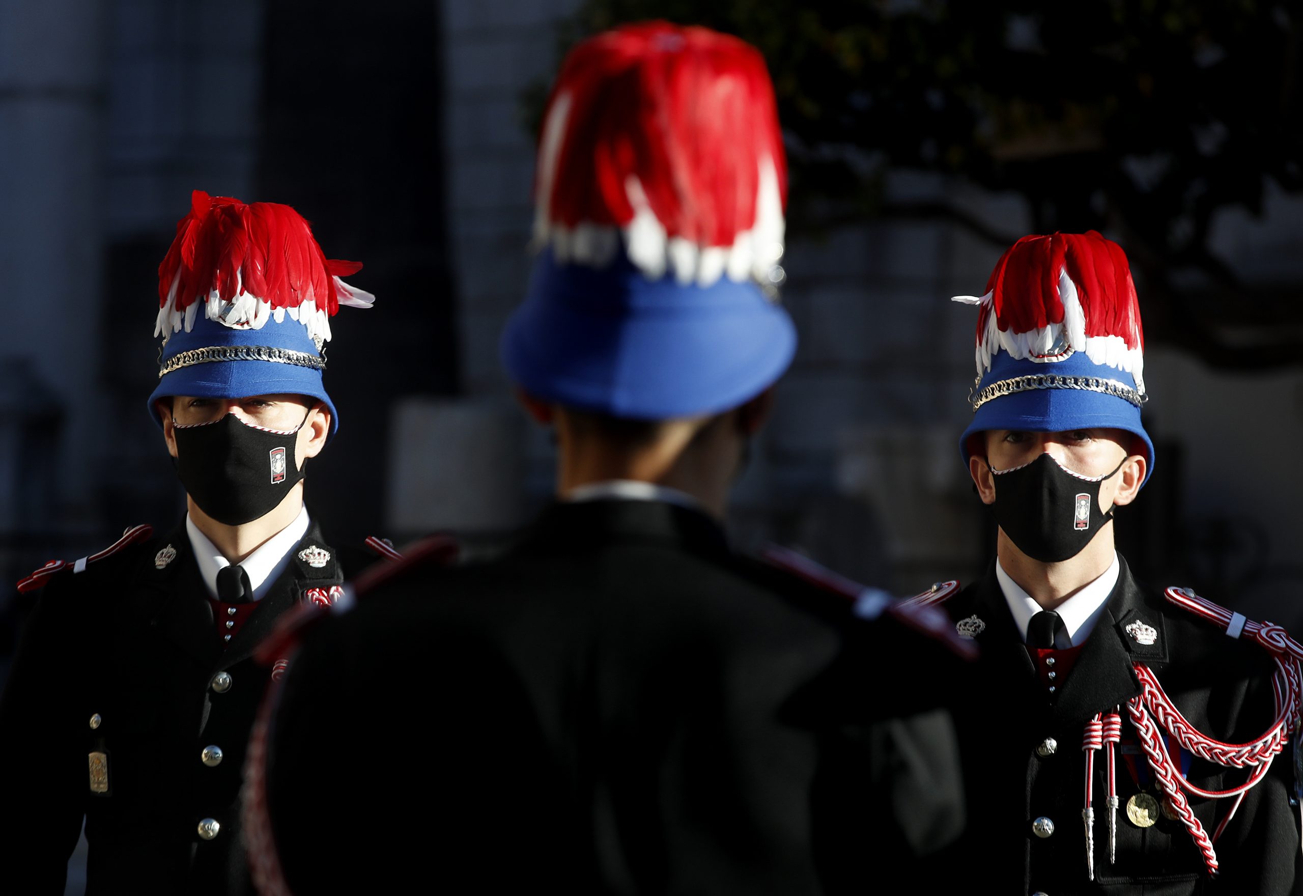 epa08829008 Guards participate in the celebrations marking National Day at the Monaco Palace, in Monaco, 19 November 2020. The National Day of Monaco is also known as The Sovereign Prince's Day.  EPA-EFE/SEBASTIEN NOGIER