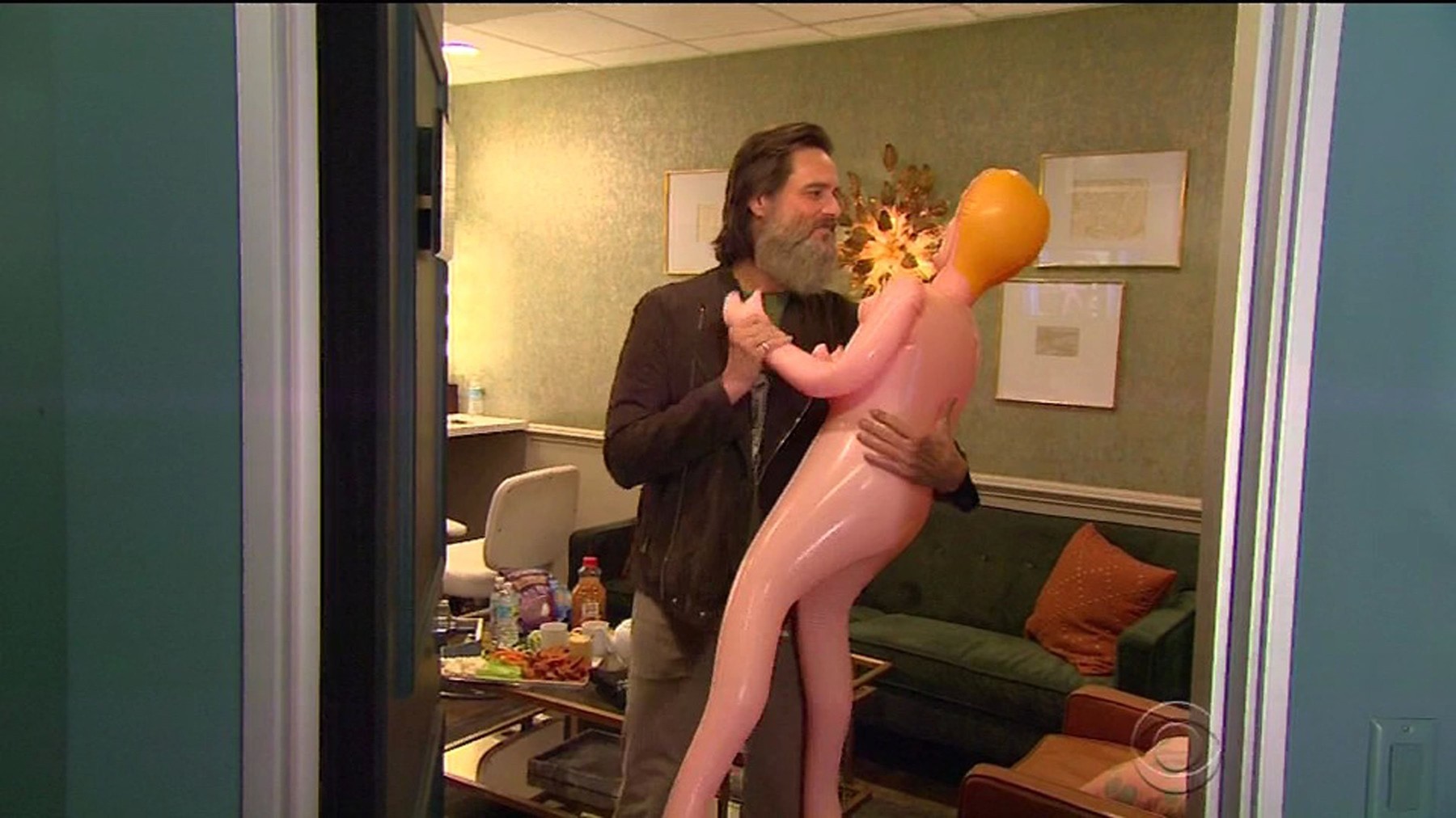 Jim Carrey shows off his sex doll that he's named Melania as he appears on The Late Late Show with James Corden