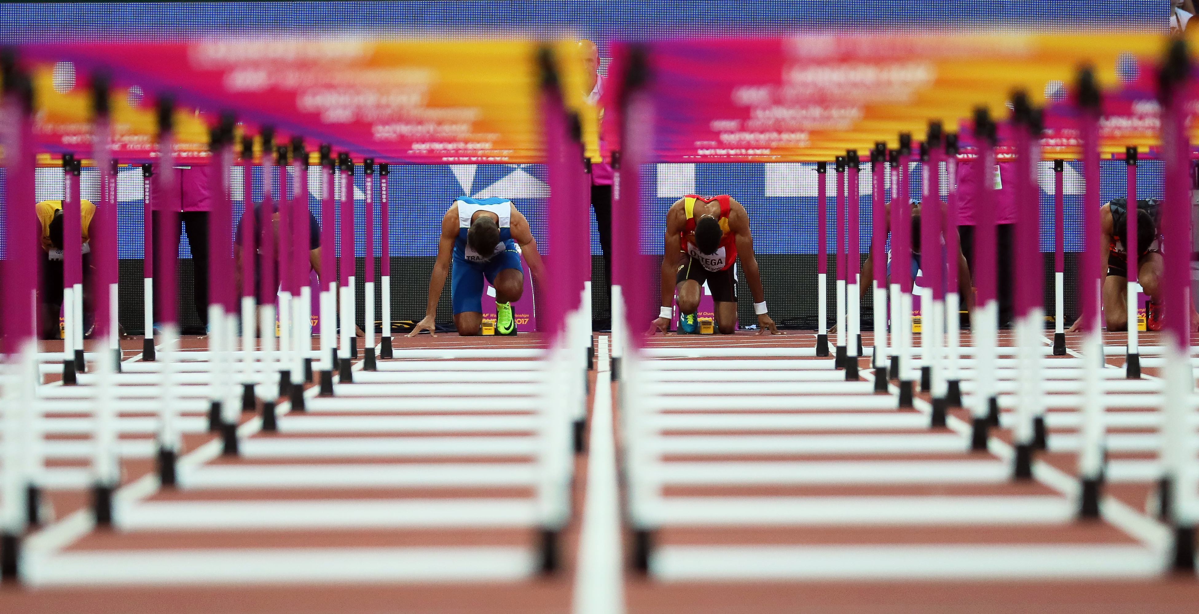 epaselect epa06129089 Milan Trajkovic (C-L) of Cyprus and Spain's Orlando Ortega (C-R) compete in the men's 110m Hurdles semi finals at the London 2017 IAAF World Championships in London, Britain, 06 August 2017.  EPA/SRDJAN SUKI