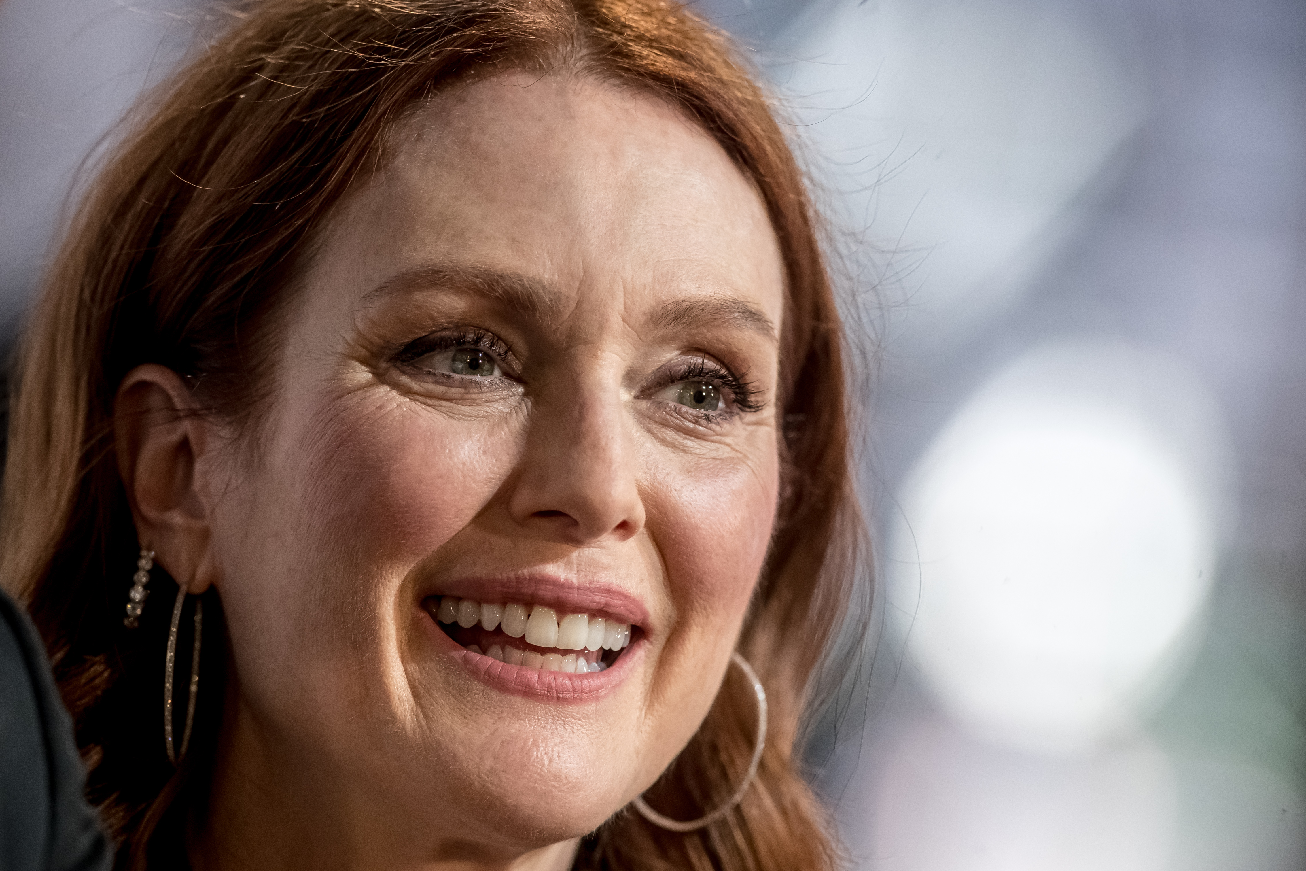 epa07680745 US actress Julianne Moore talks to media before opening ceremony of the 54th Karlovy Vary International Film Festival, in Karlovy Vary, Czech Republic, 28 June 2019. The festival runs from 28 June to 06 July.  EPA-EFE/MARTIN DIVISEK