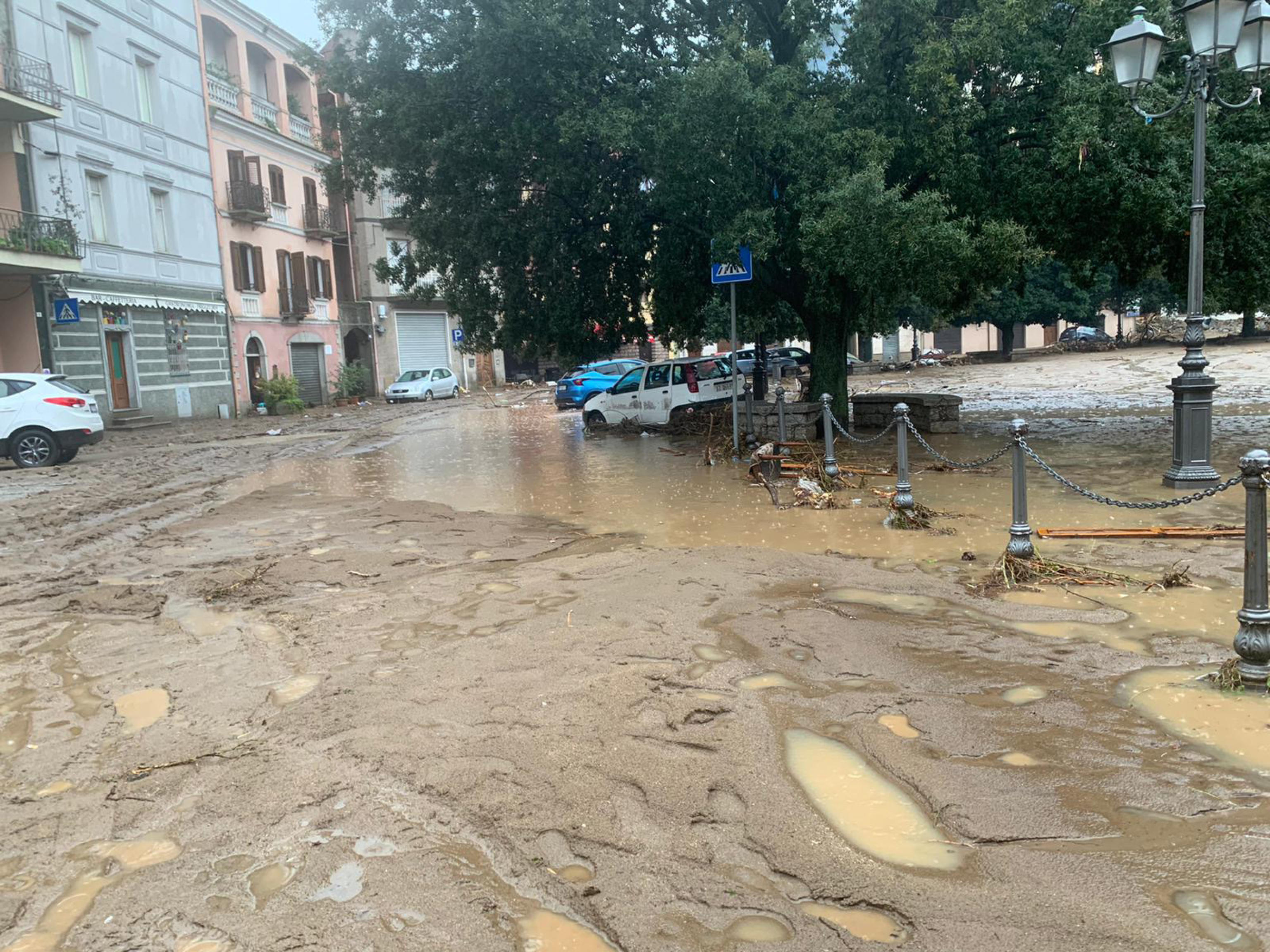 epa08850592 A view on a flodded street in Bitti in the Sardinia island, Italy, 29 November 2020. According to reports, three people have been killed in a flooding and mudslides after heavy rains in Bitti.  EPA-EFE/CRISTIAN FARINA