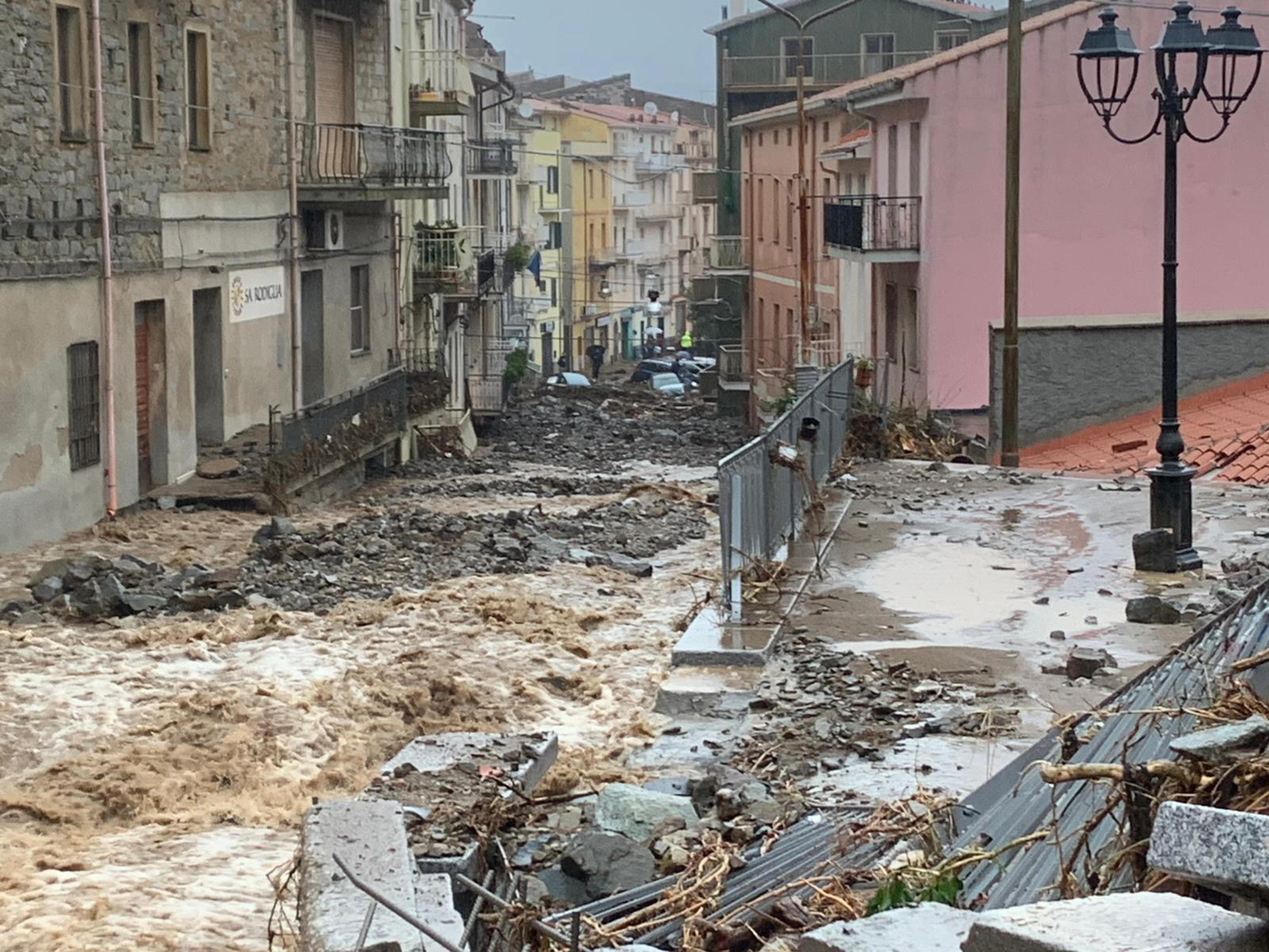 epa08850597 The damage caused by the flood that hit Bitti in the Sardinia island, Italy, 29 November 2020. According to reports, three people have been killed in a flooding and mudslides after heavy rains in Bitti.  EPA-EFE/CRISTIAN FARINA