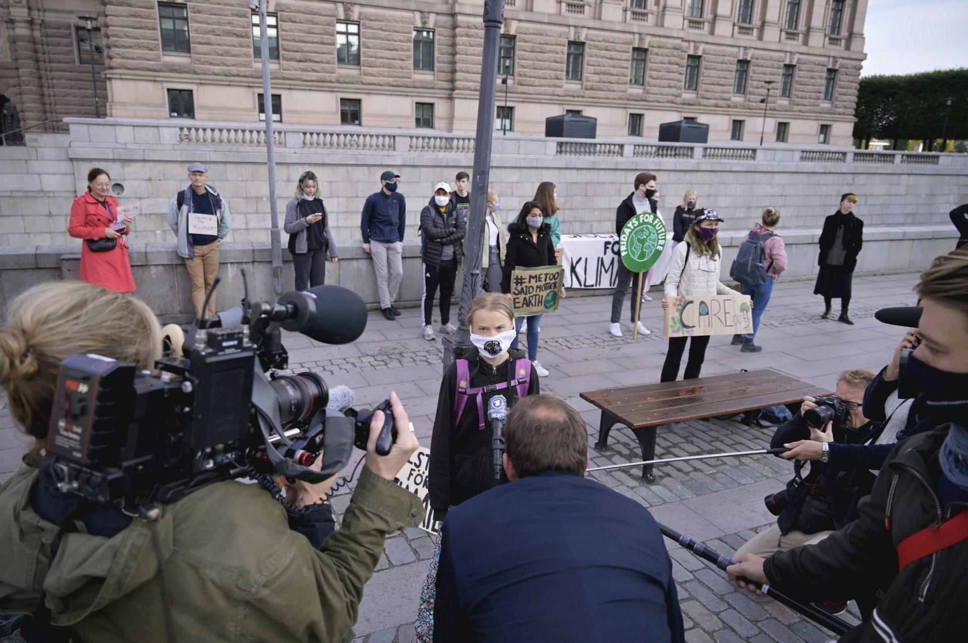 epa08695607 Swedish climate activist Greta Thunberg holds a sign reading School strike for Climate as she protests in front of the Swedish Parliament Riksdagen in Stockholm, Sweden, 25 September 2020.  EPA-EFE/Janerik Henriksson  SWEDEN OUT