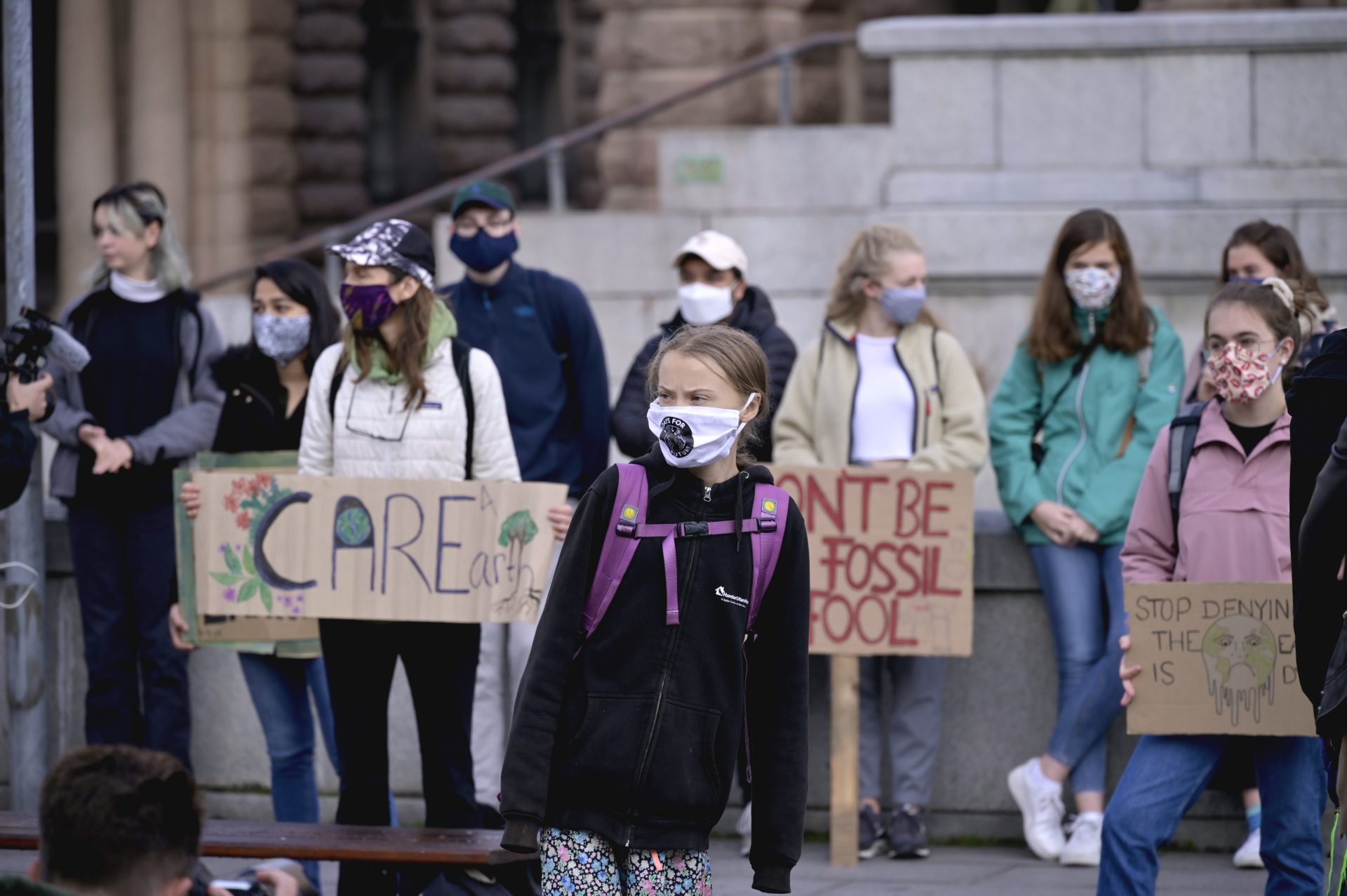 epa08695608 Swedish climate activist Greta Thunberg holds a sign reading School strike for Climate as she protests in front of the Swedish Parliament Riksdagen in Stockholm, Sweden, 25 September 2020.  EPA-EFE/Janerik Henriksson  SWEDEN OUT