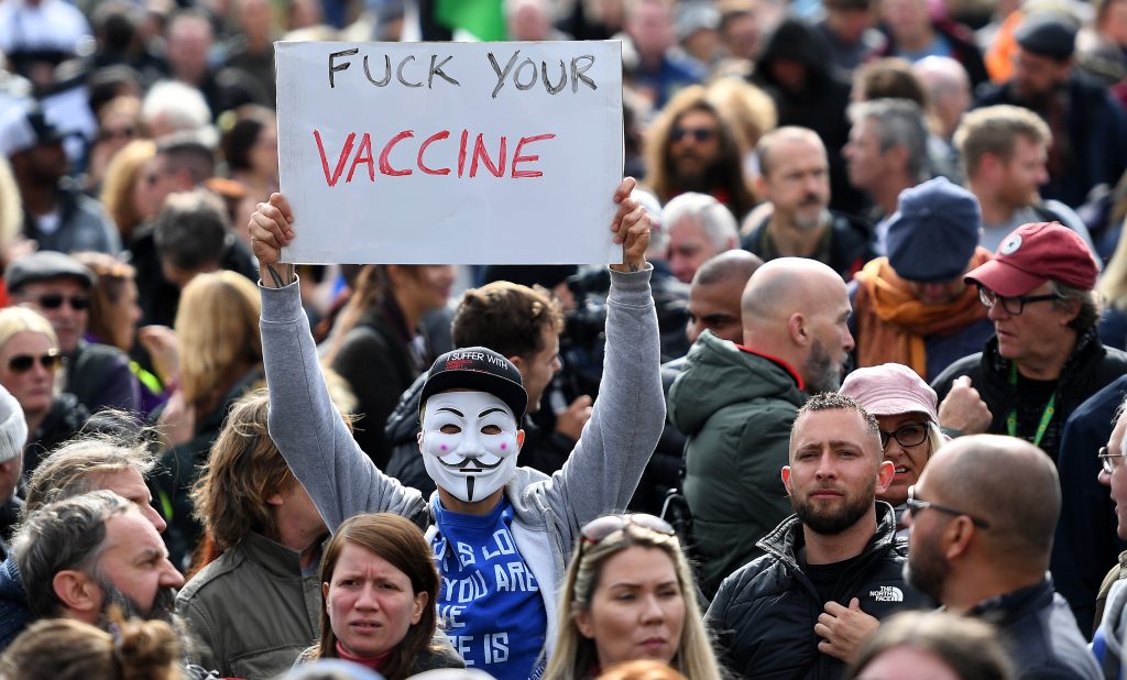 epa08698866 People attend a 'We Do Not Consent' rally at Trafalgar Square in London, Britain, 26 September 2020. Thousends of people gathered at a demonstration to protest against new coronavirus restrictions.  EPA-EFE/ANDY RAIN