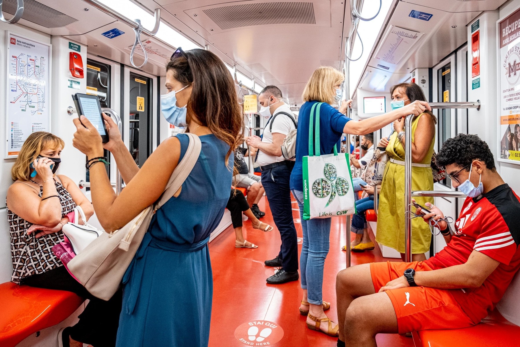 Passengers wear a protective masks to prevent coronavirus infection in Metro