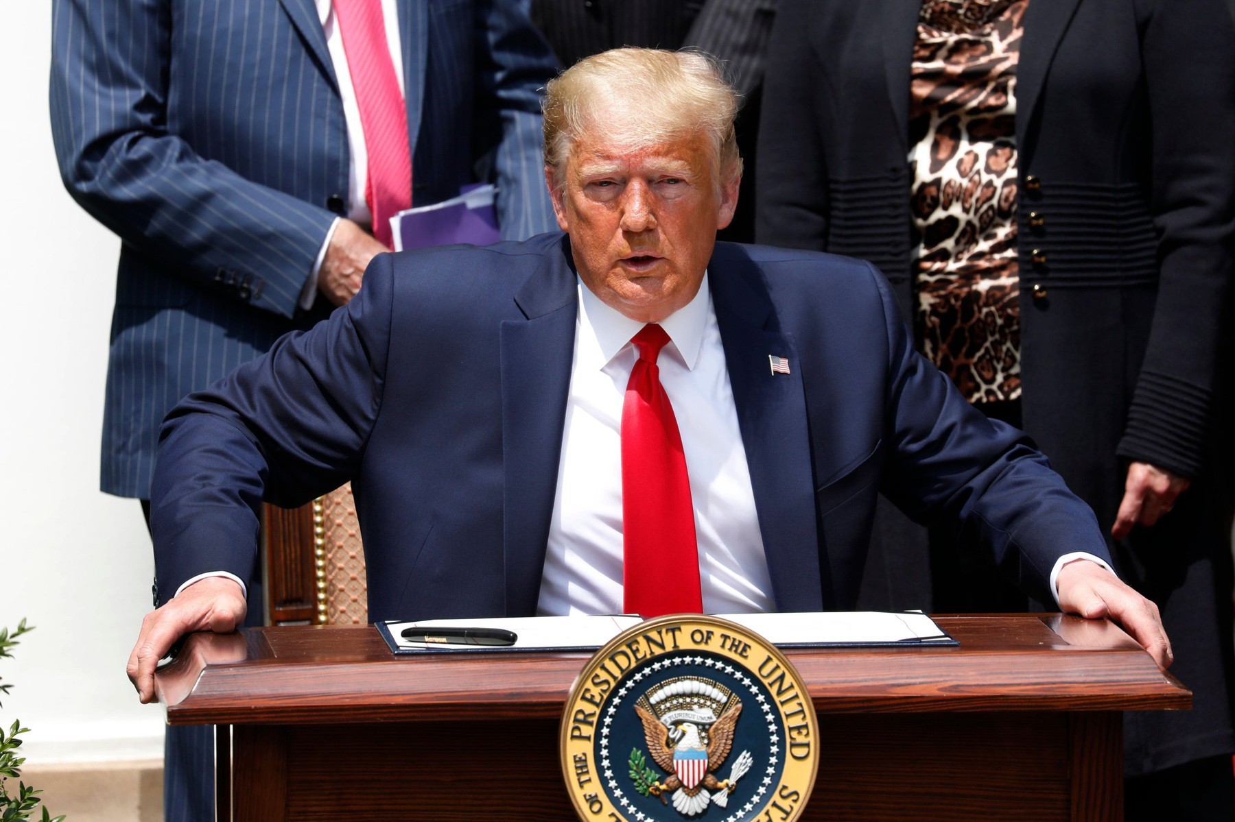 United States President Donald J. Trump takes a seat to sign H.R. 7010 - PPP Flexibility Act of 2020 in the Rose Garden of the White House in Washington, DC on June 5, 2020. Credit: Yuri Gripas/Pool via CNP /MediaPunch